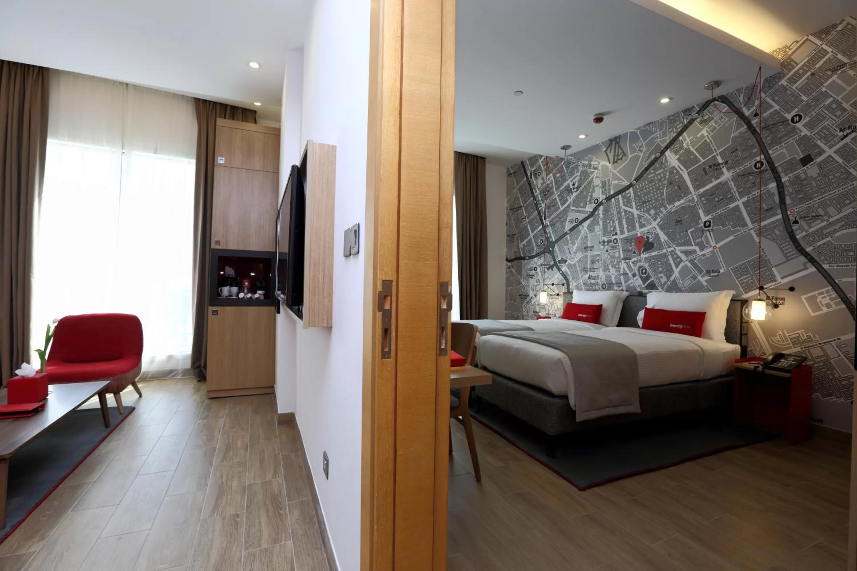 Living room, Bed in IntercityHotel Riyadh Malaz