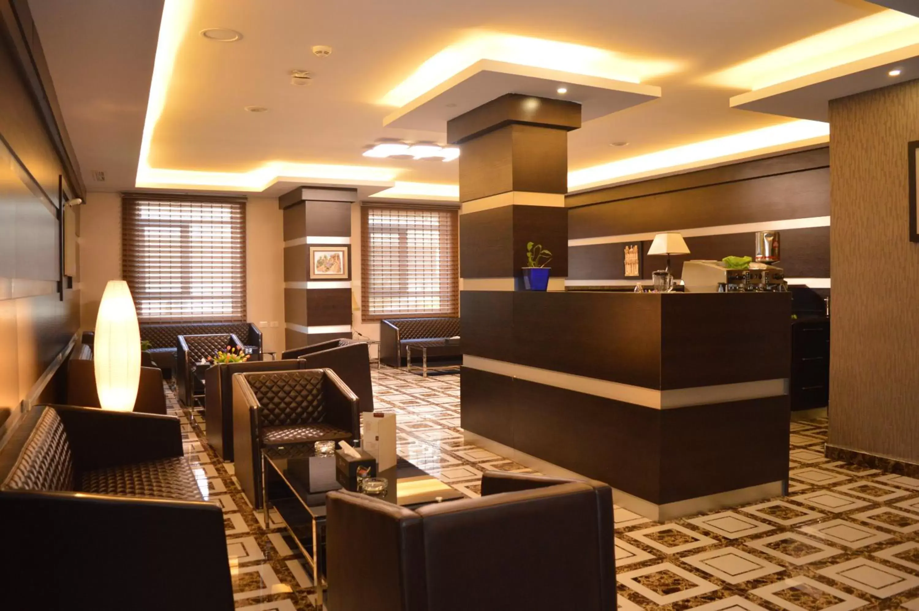 Lounge or bar in Tilal Almadina Hotel & Suites Lounge or bar in Tilal Almadina Hotel & Suites