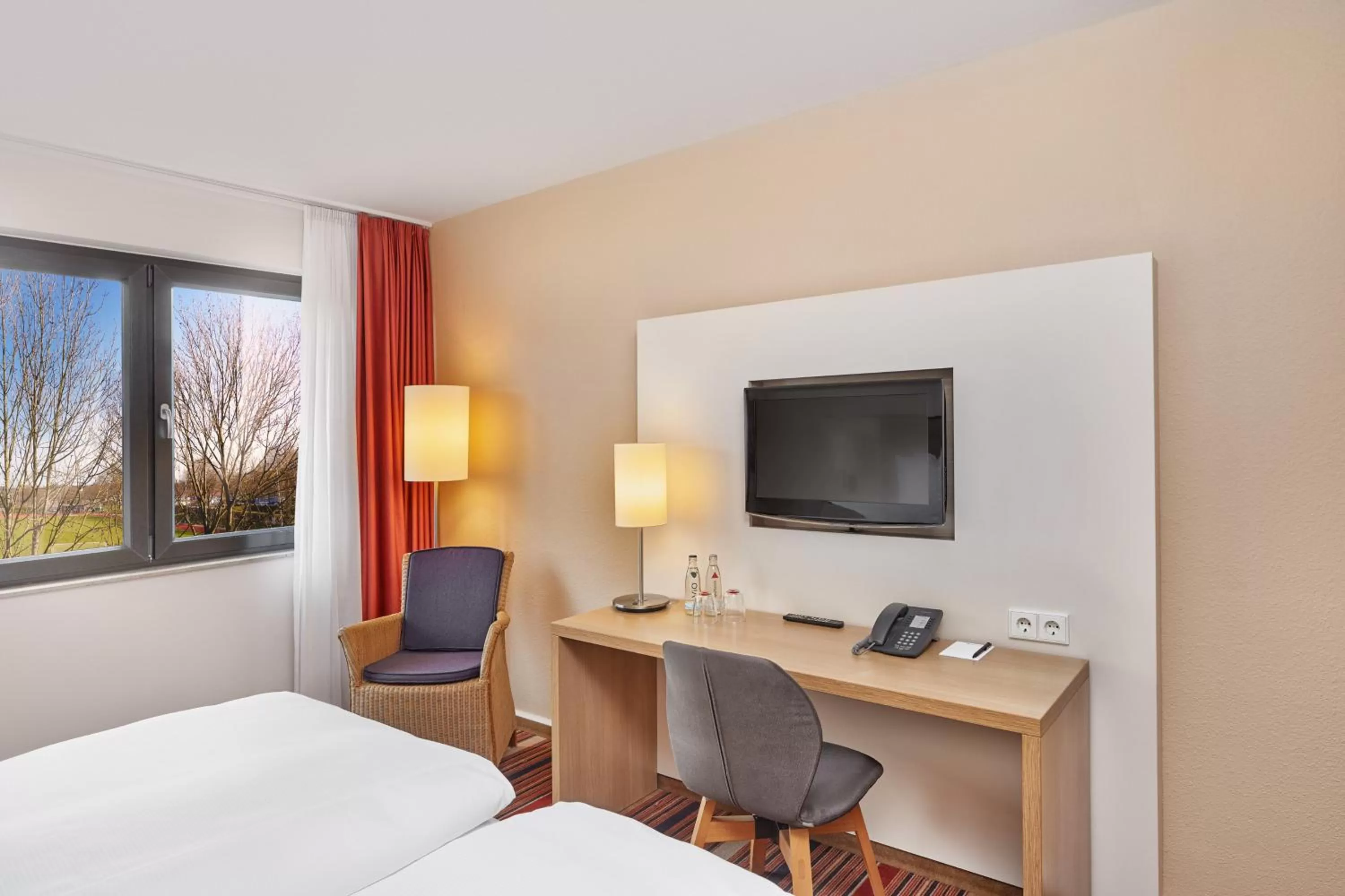 Photo of the whole room, Bed in H+ Hotel Bochum