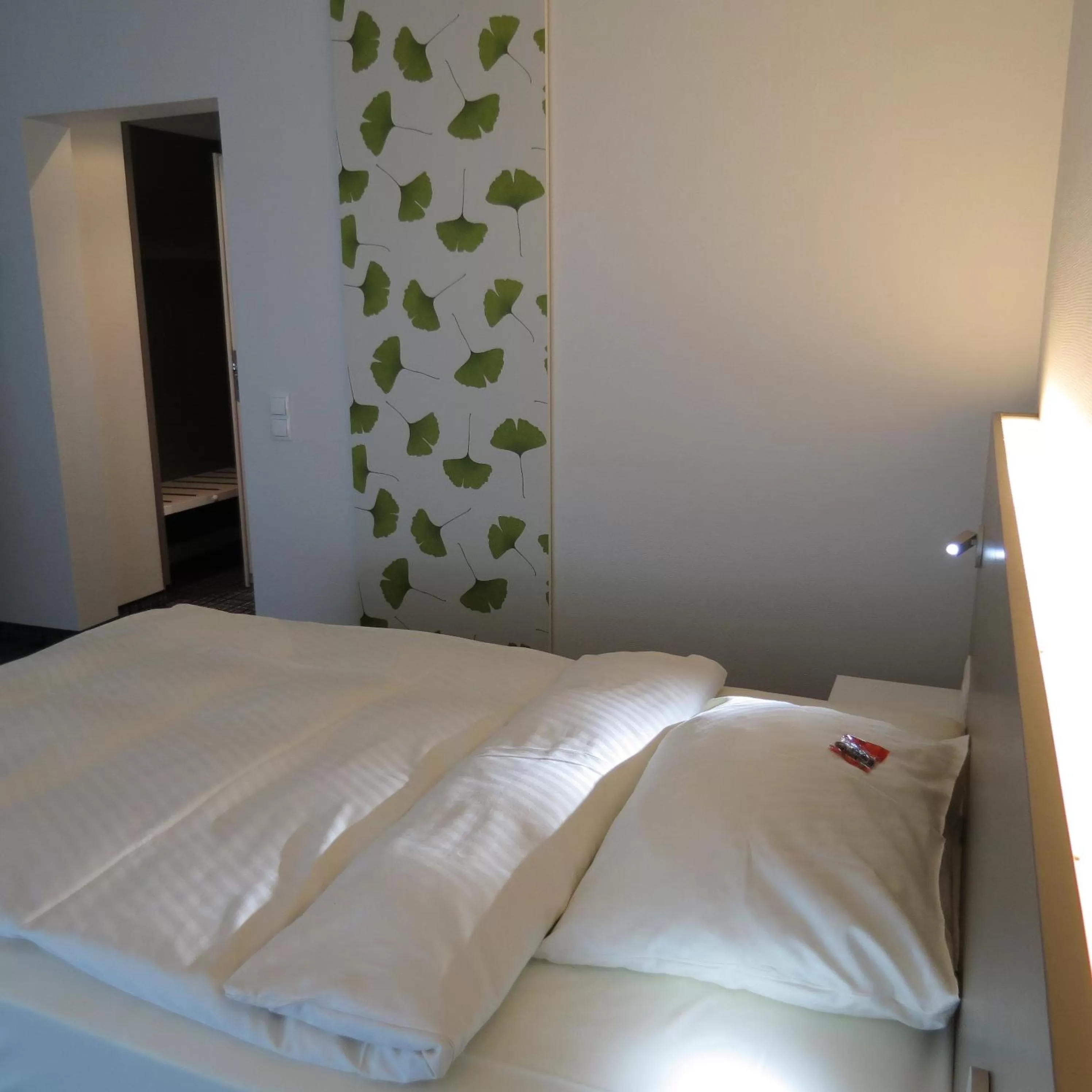Bed in Comfor Hotel Ulm City
