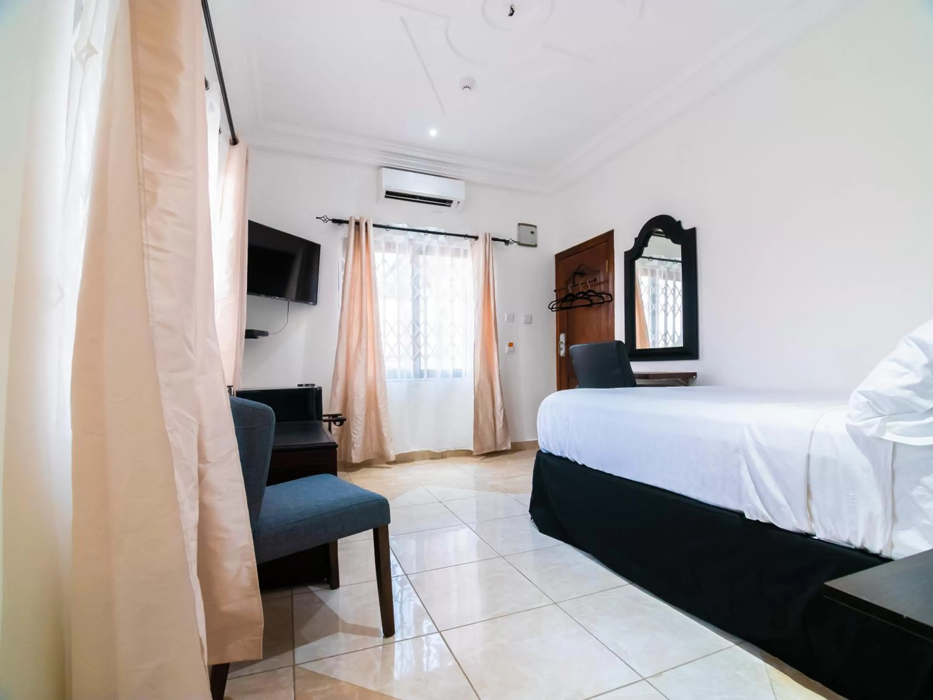 Bed in KoKo Palm Inn LTD