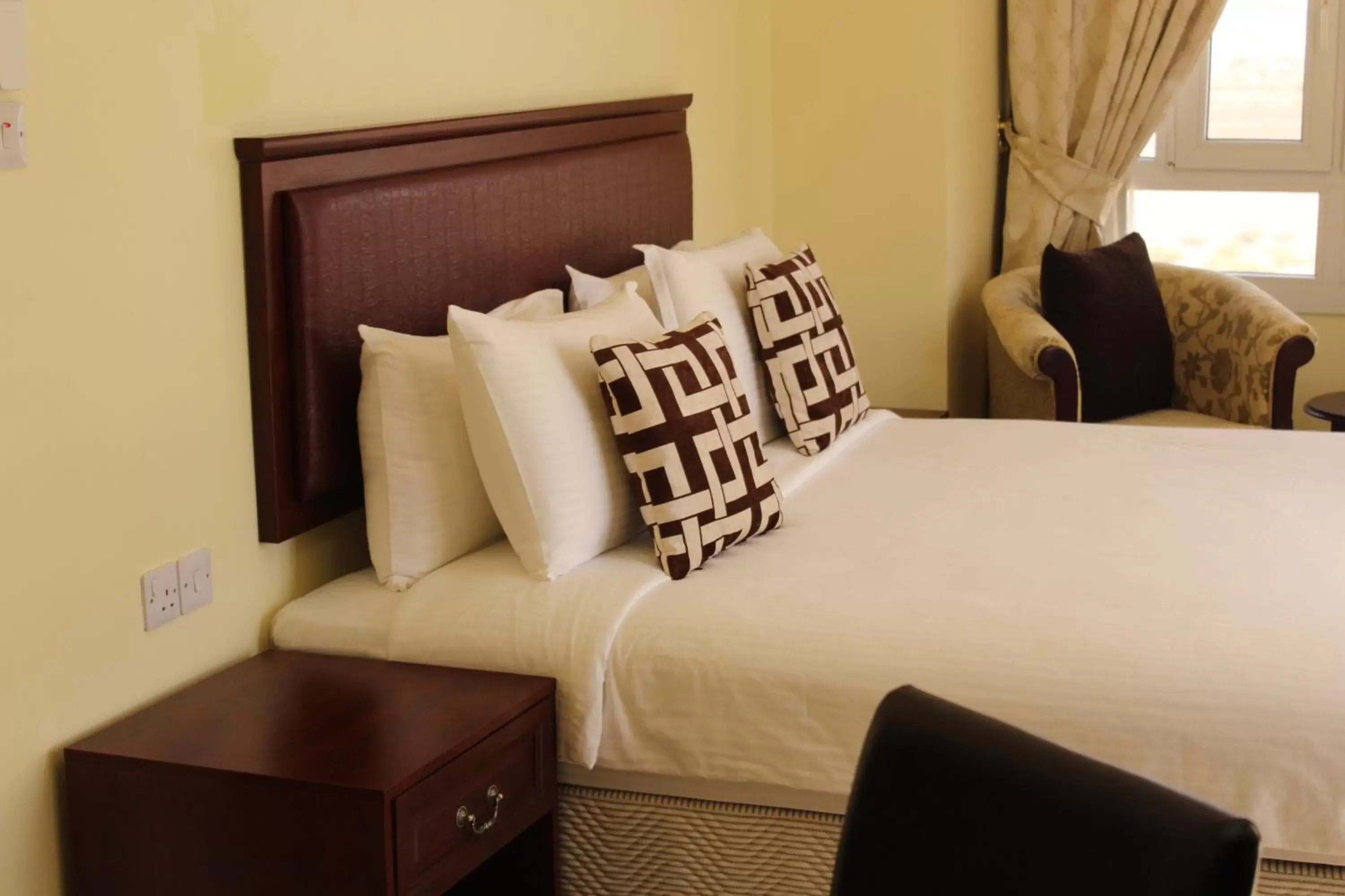 Bed in Nizwa Hotel Apartments