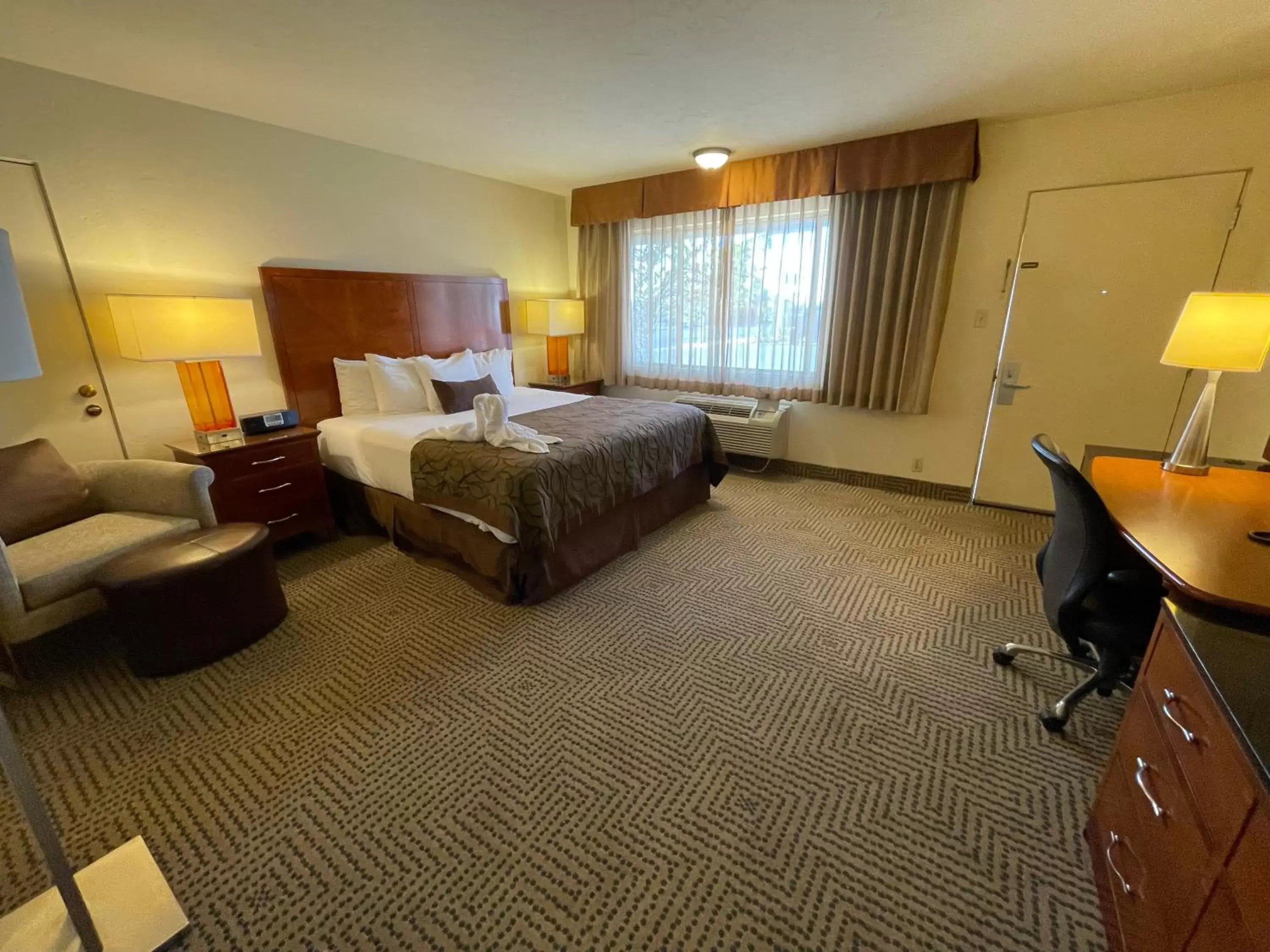 Bedroom in Coronado Motor Hotel, a Travelodge by Wyndham