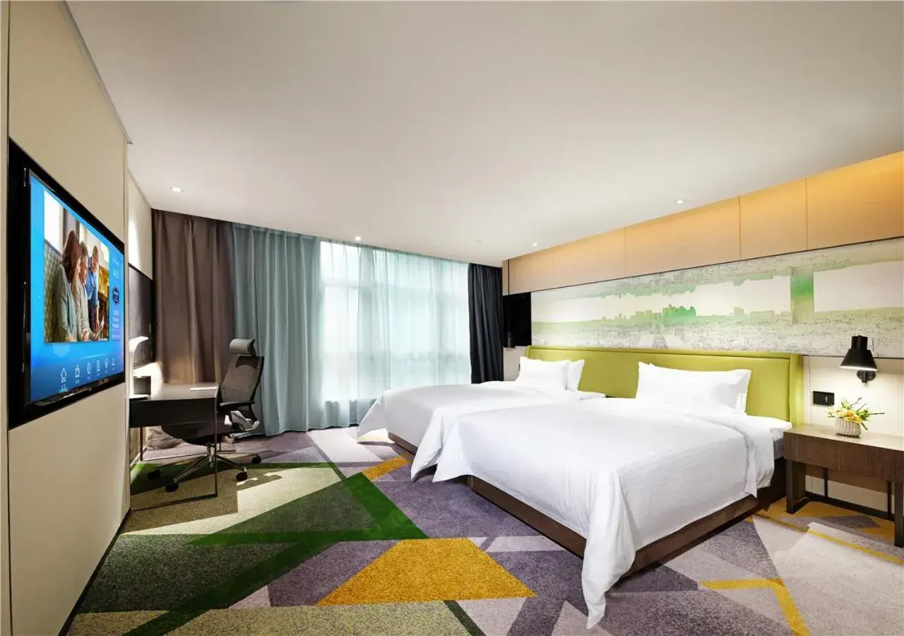 Bed in Hampton by Hilton Guangzhou Tianhe Sports Center