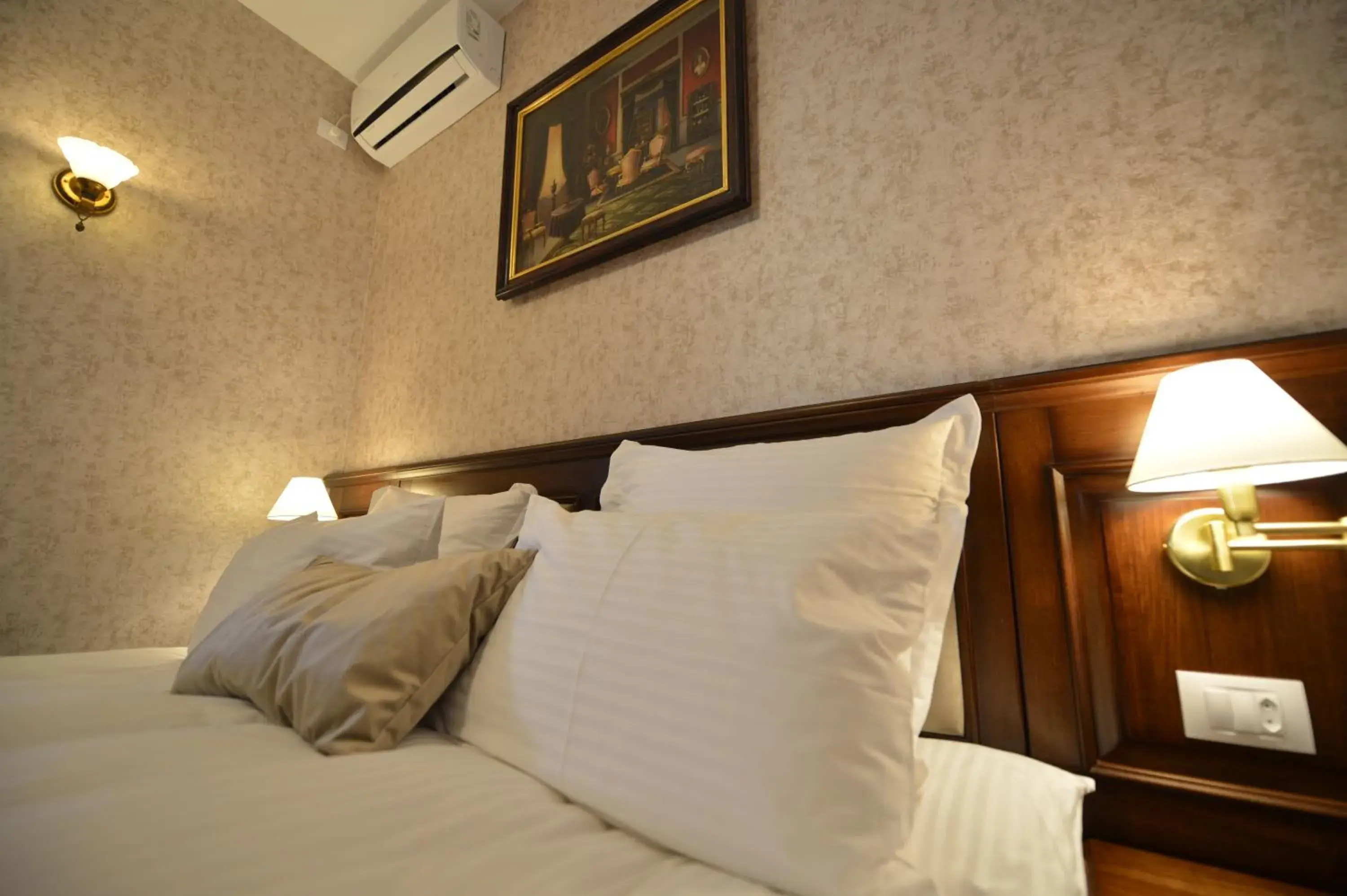 Bed in Noblesse Boutique Hotel