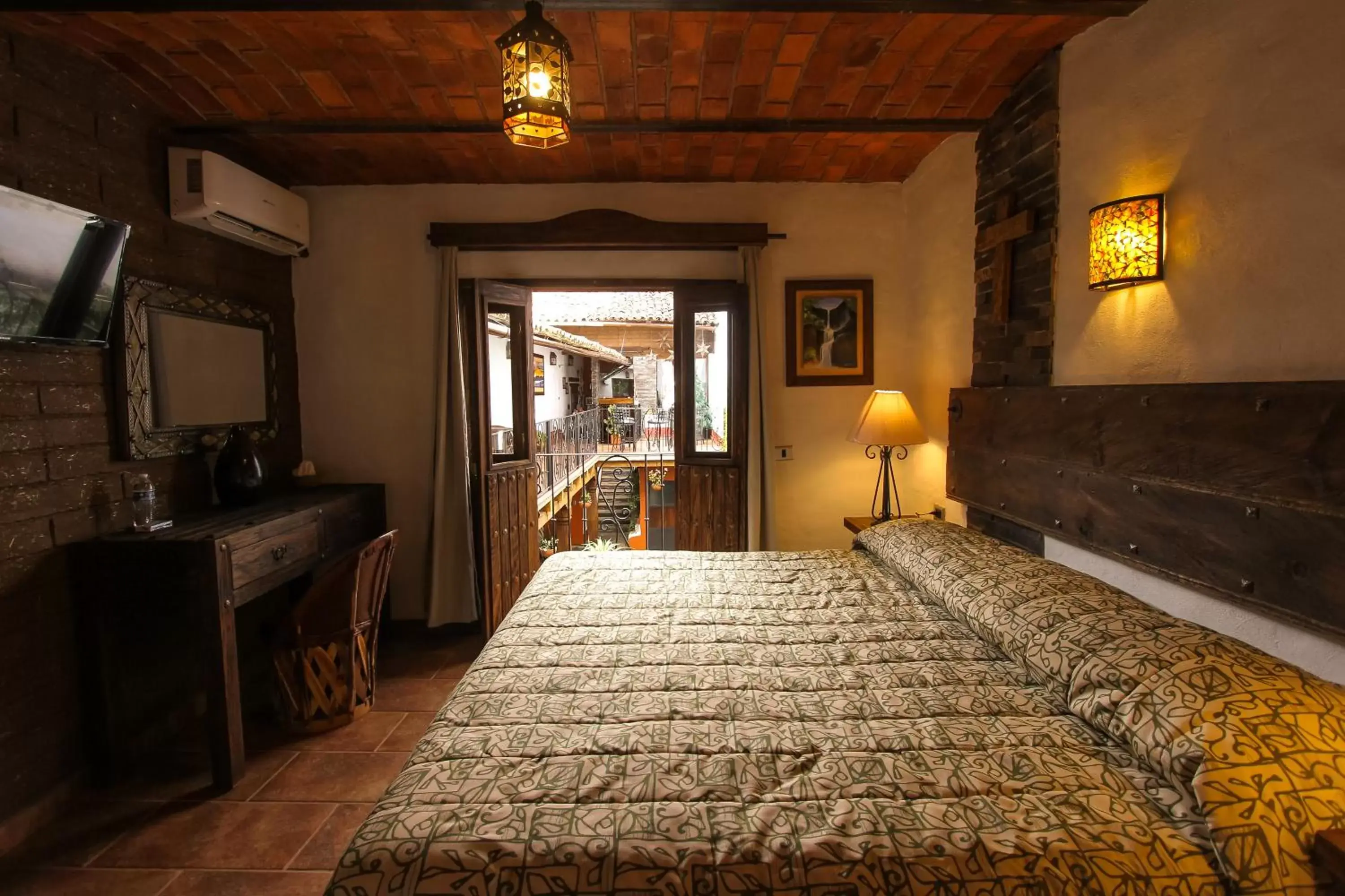 Photo of the whole room, Bed in Hotel Mi Pueblito by Rotamundos