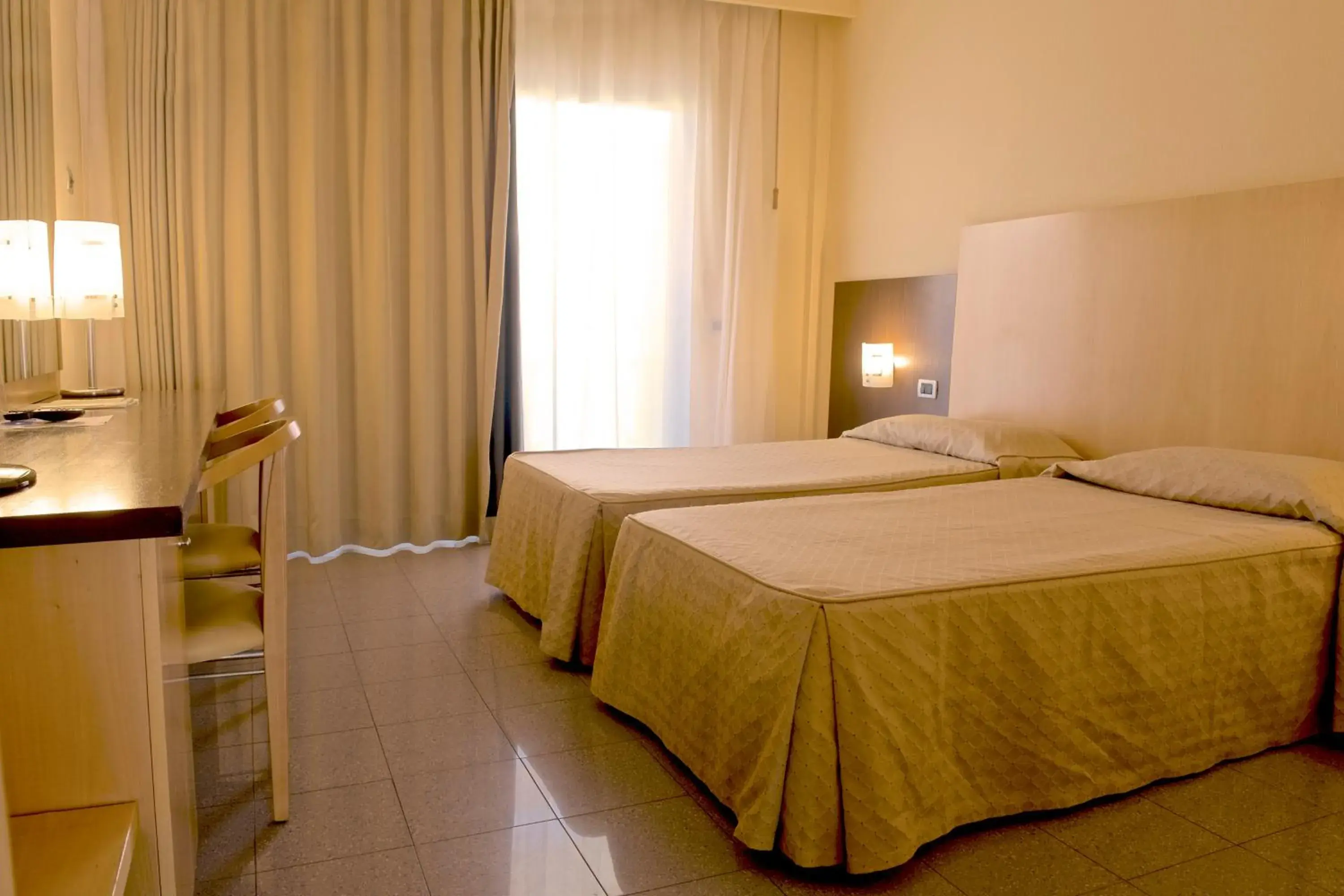 Bed in Albergo Mediterraneo