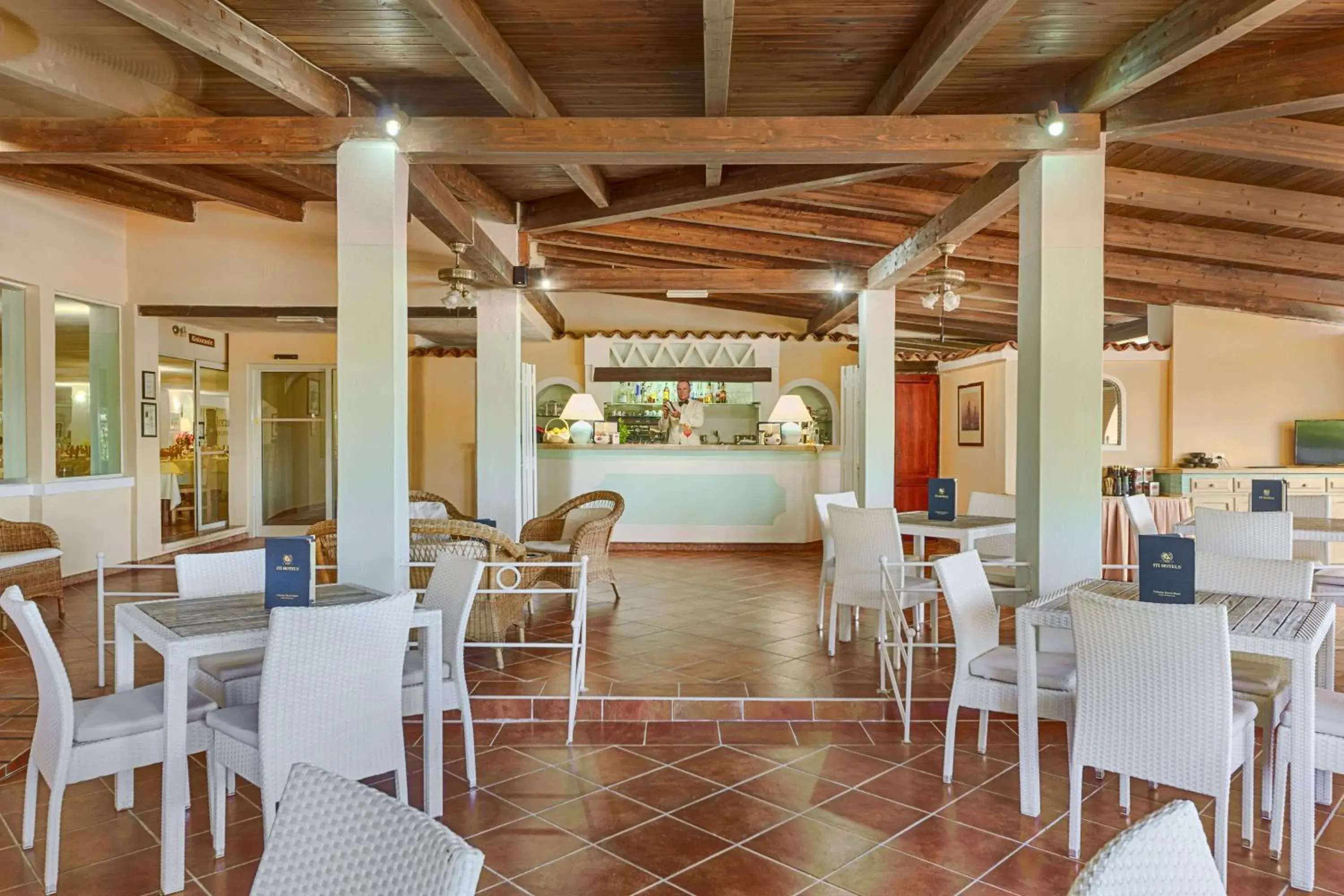 Lounge or bar in Colonna Beach Hotel Marinella Lounge or bar in Colonna Beach Hotel Marinella