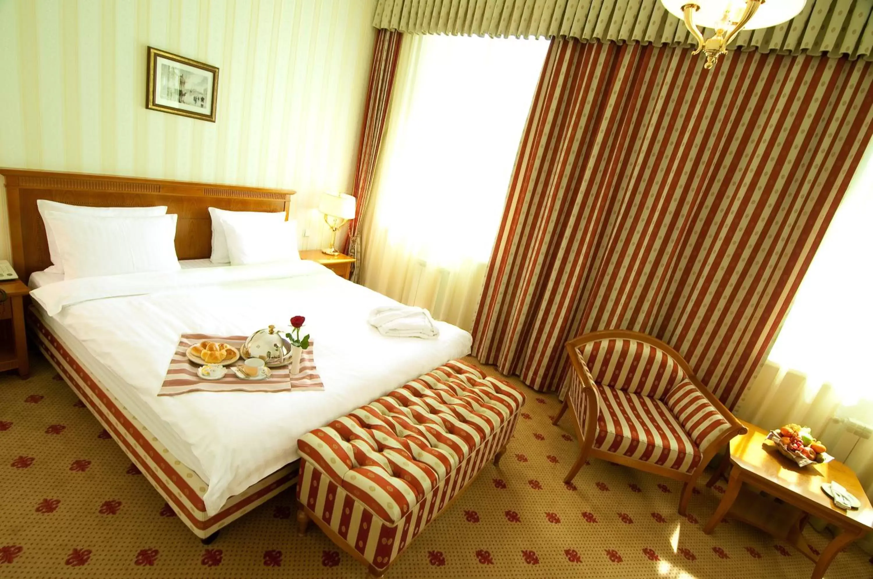 Bed in Grand Tien Shan Hotel