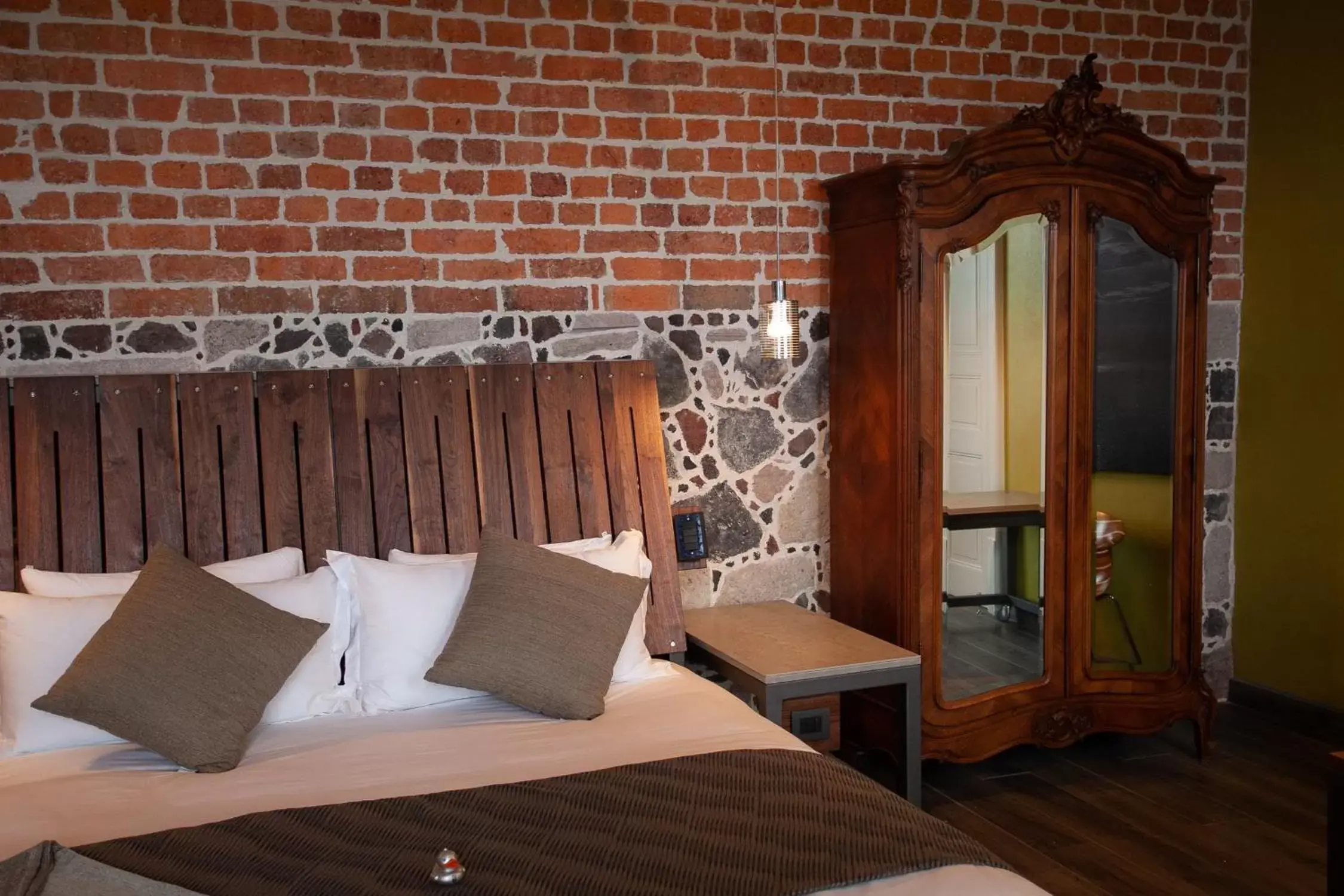 Bed in Mumedi Design Hotel