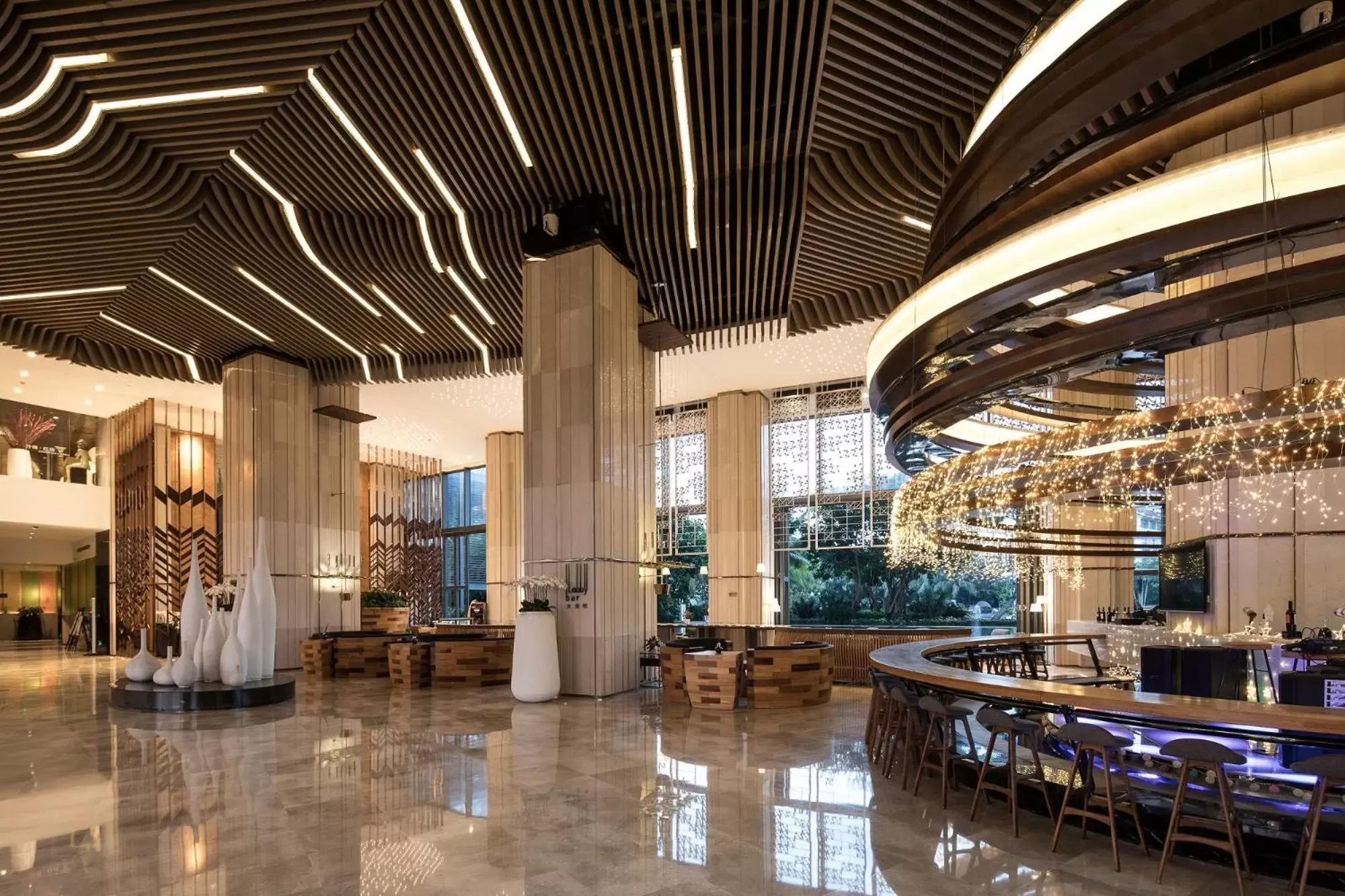 Lounge or bar, Lobby/Reception in Ramada Plaza by Wyndham Sanya Bay