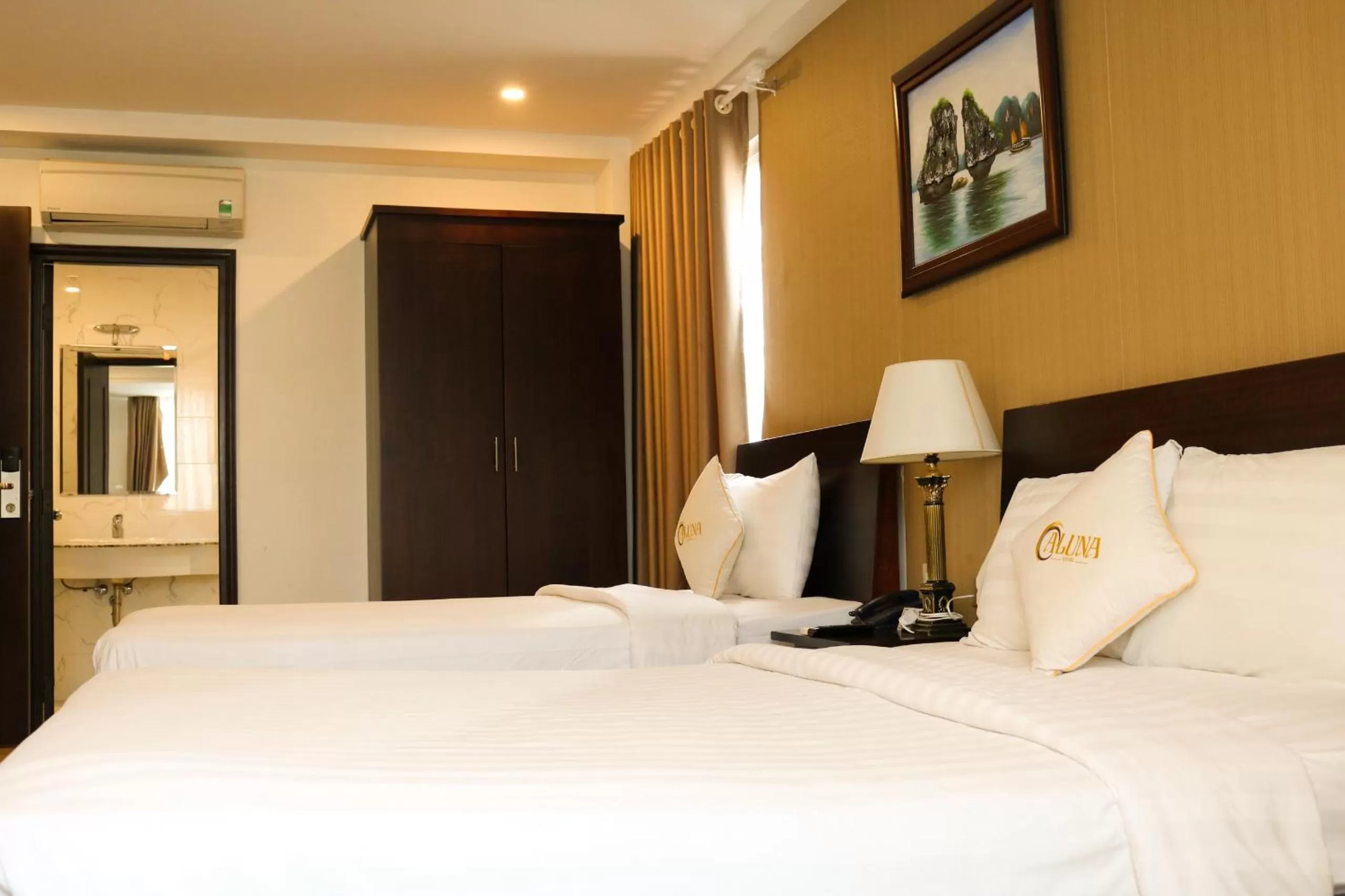 Bed in ALUNA Ben Thanh Hotel