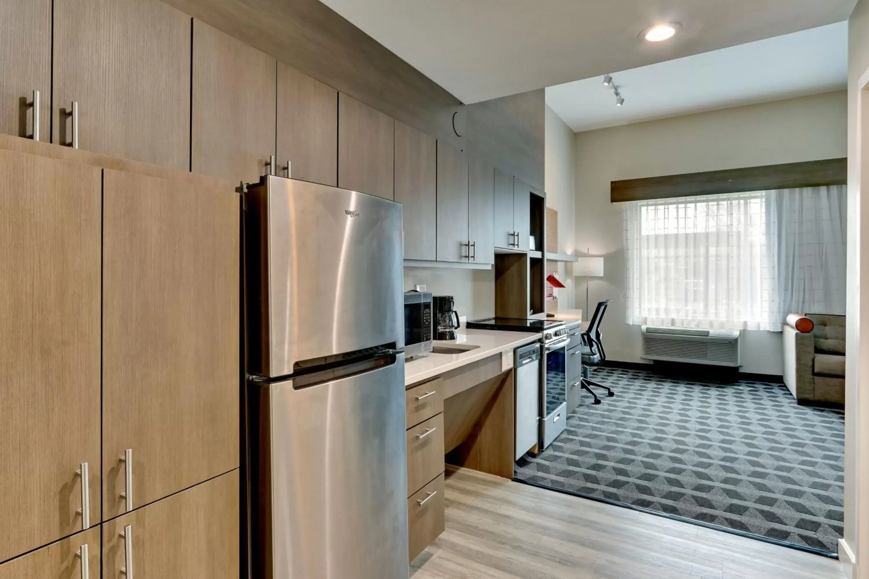 Bedroom, Kitchen/Kitchenette in TownePlace Suites by Marriott Houston Northwest Beltway 8