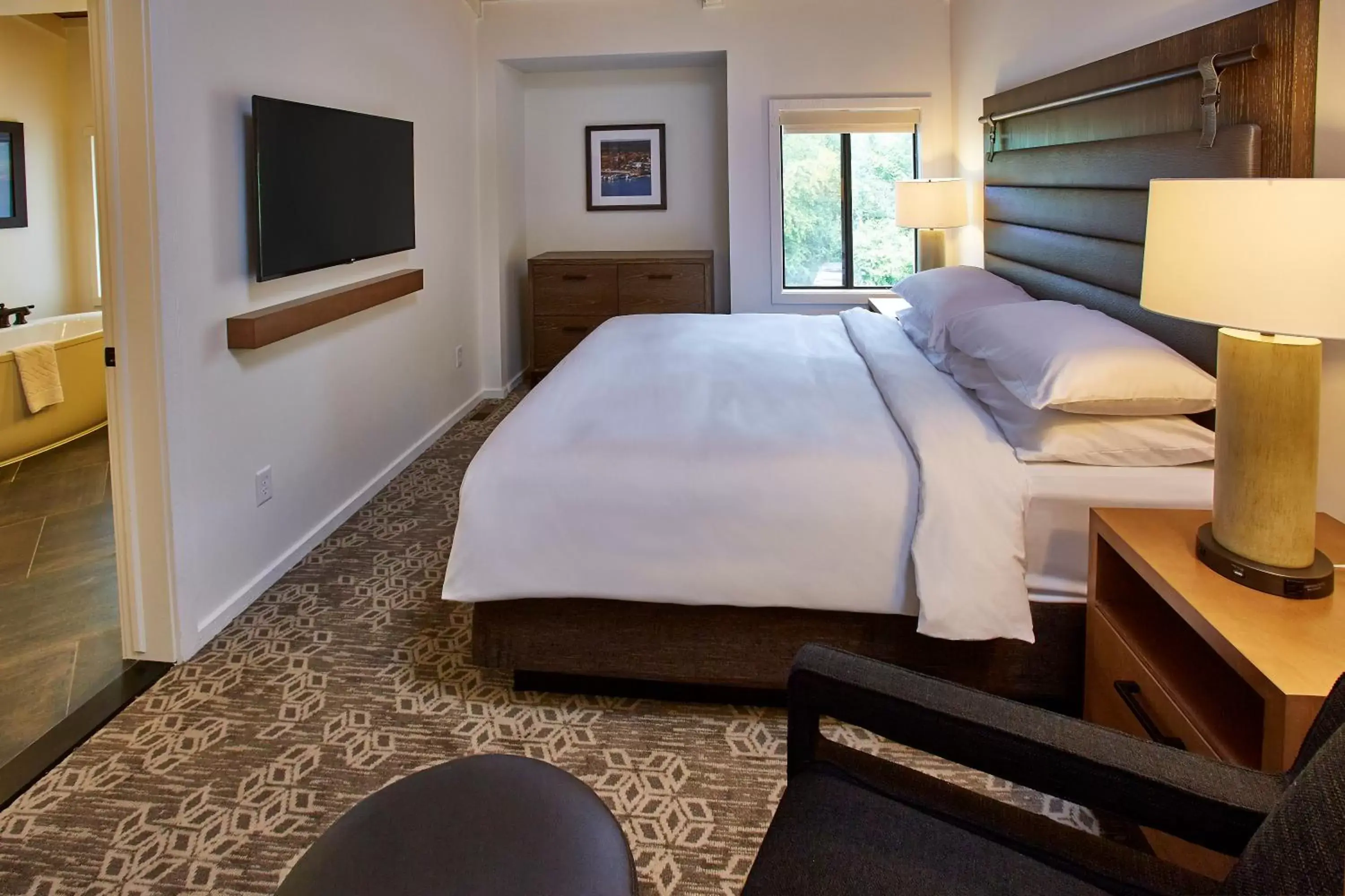 Bed in Grand Geneva Resort and Spa