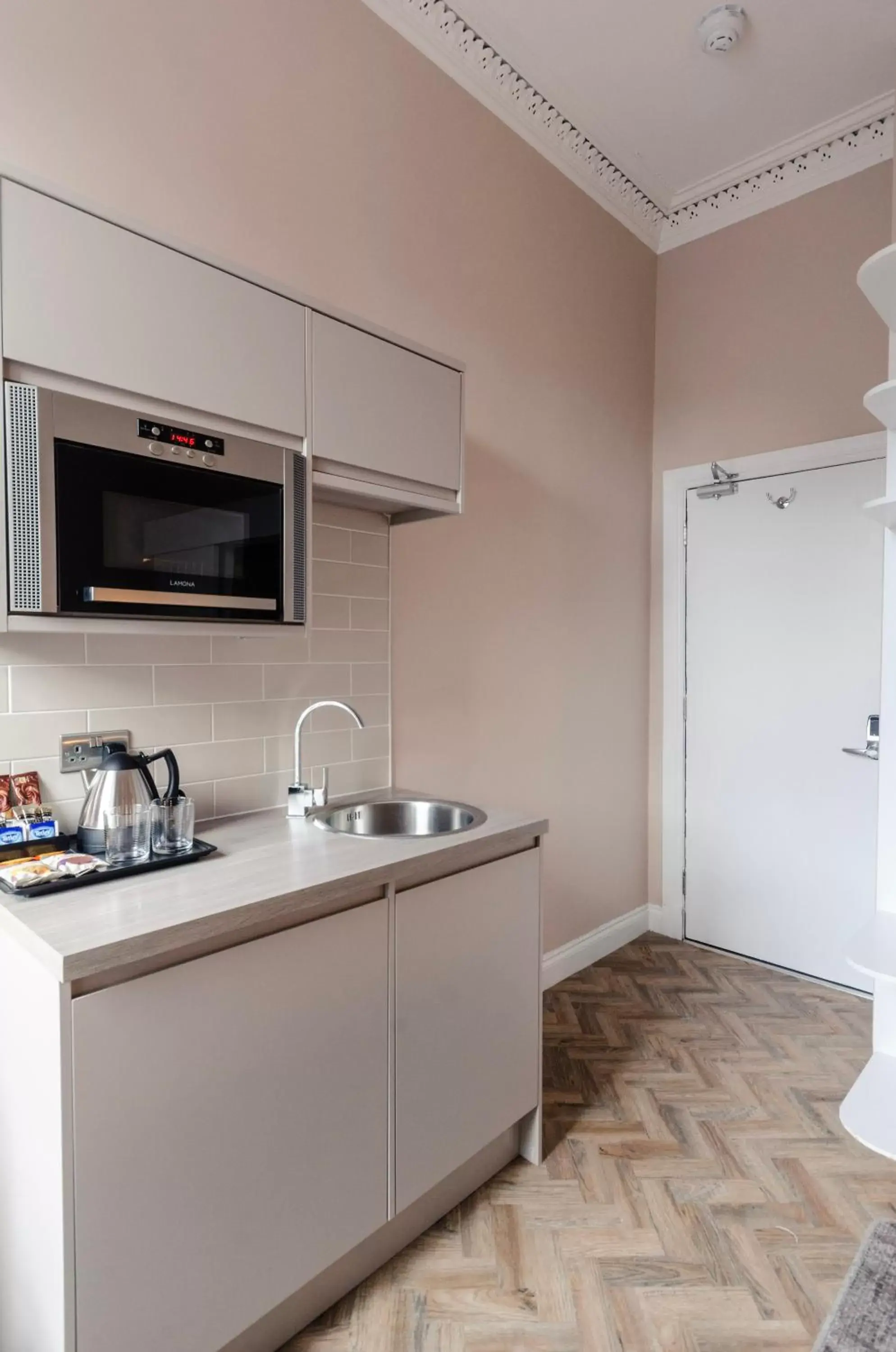 Kitchen/Kitchenette in Sweeney Apartments & Rooms