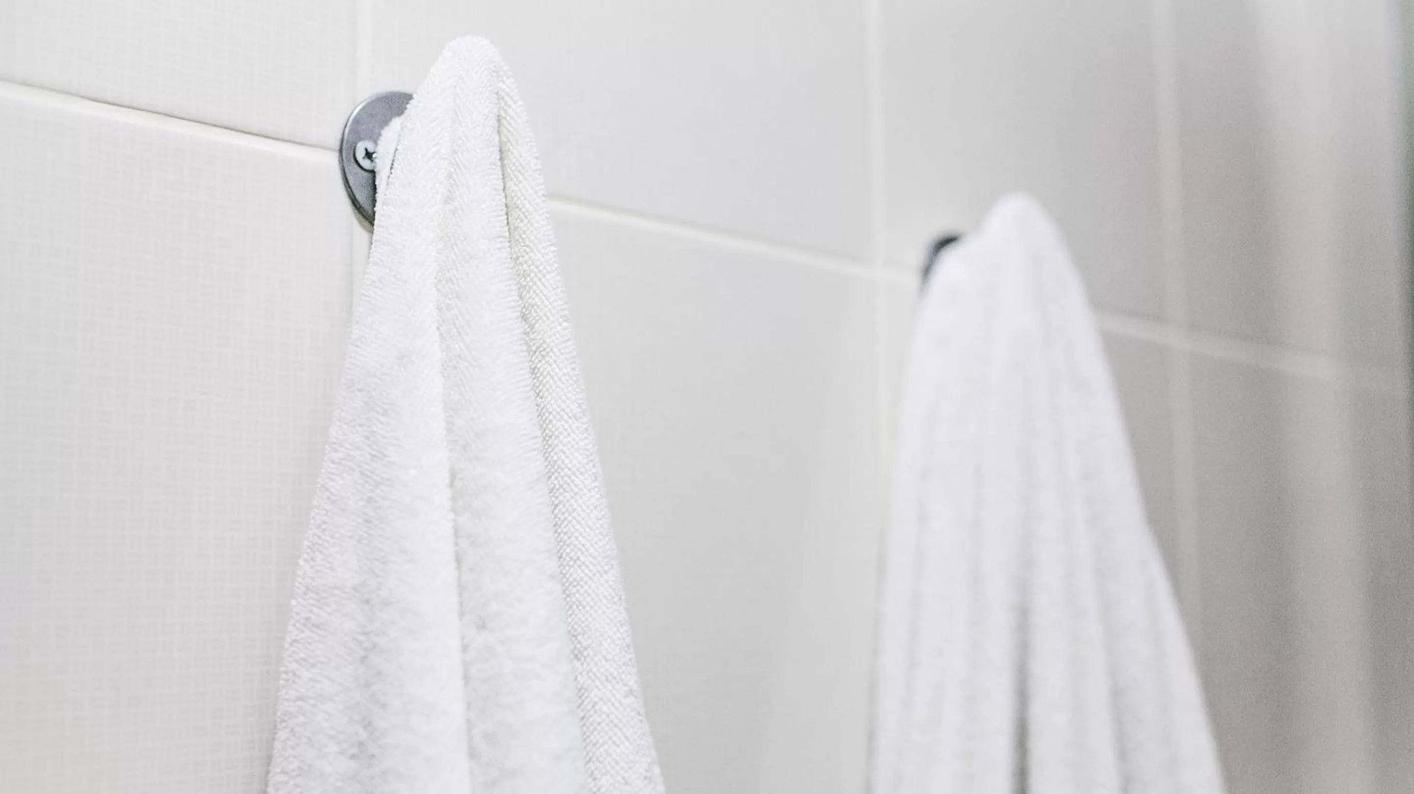 Bed in Magnuson Hotel Blythe