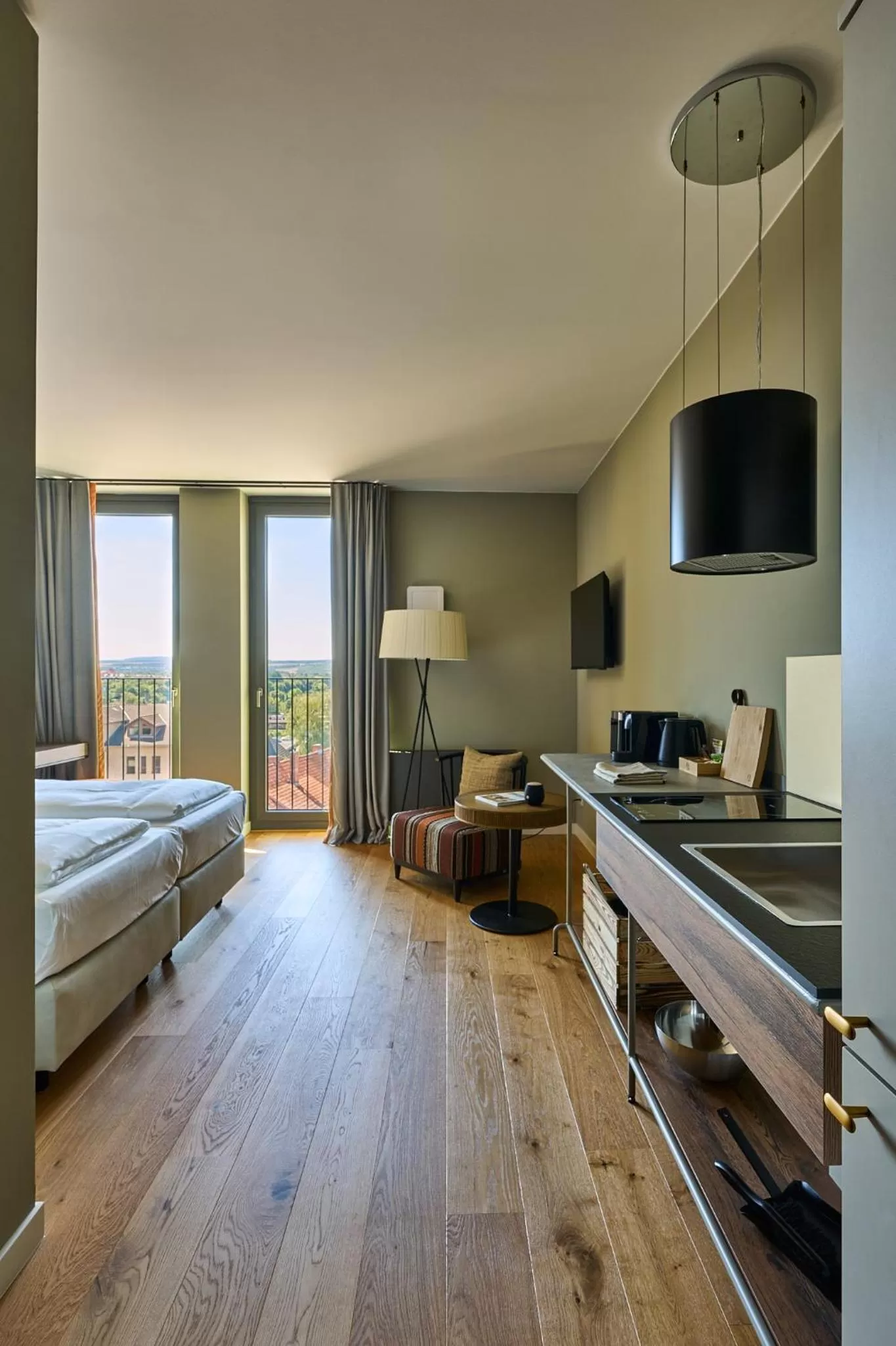 Kitchen or kitchenette, Bed in FREIgeist Homes - Serviced Apartments