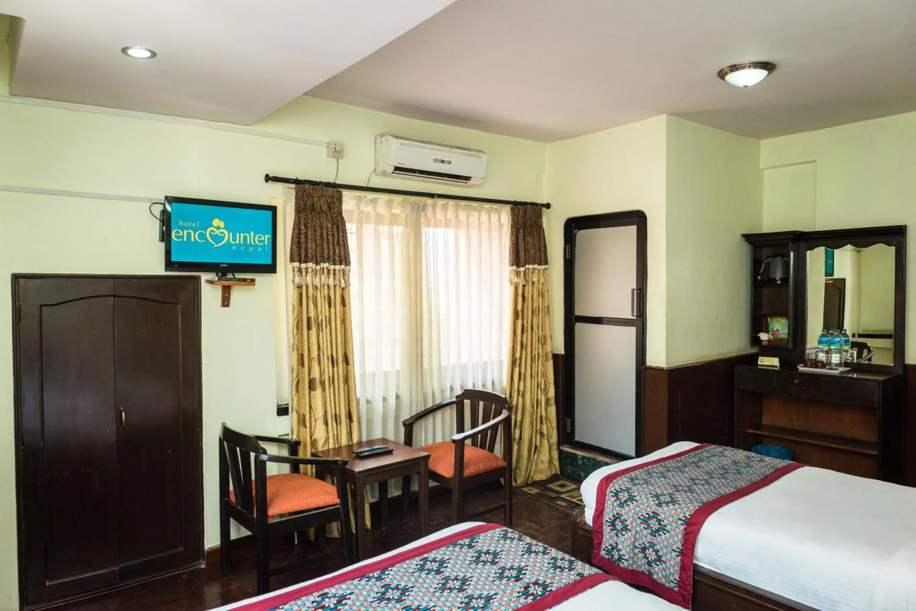 TV and multimedia, TV/Entertainment Center in Hotel Encounter Nepal