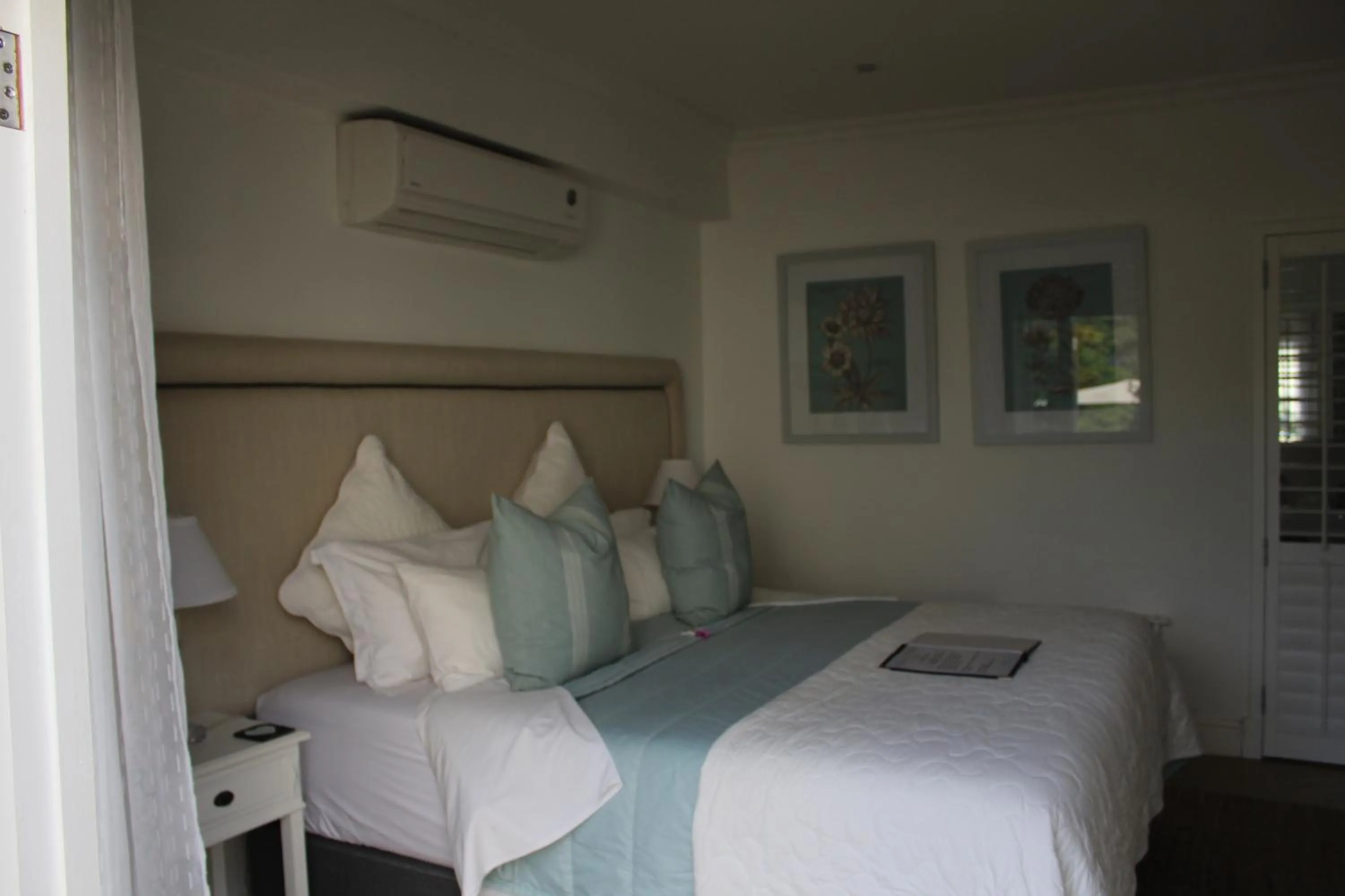 Bed in Sandals Guest House