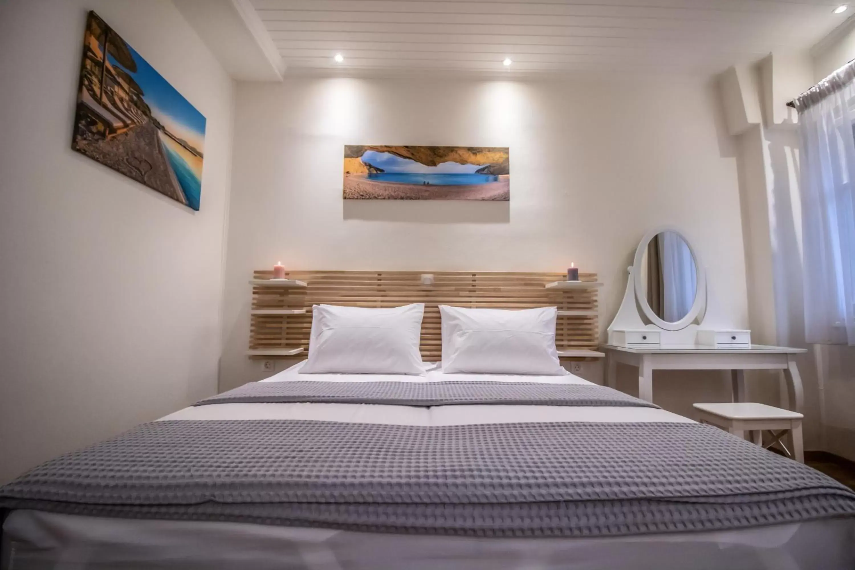 Bed in Levkosh Apartments at Lefkada's Heart