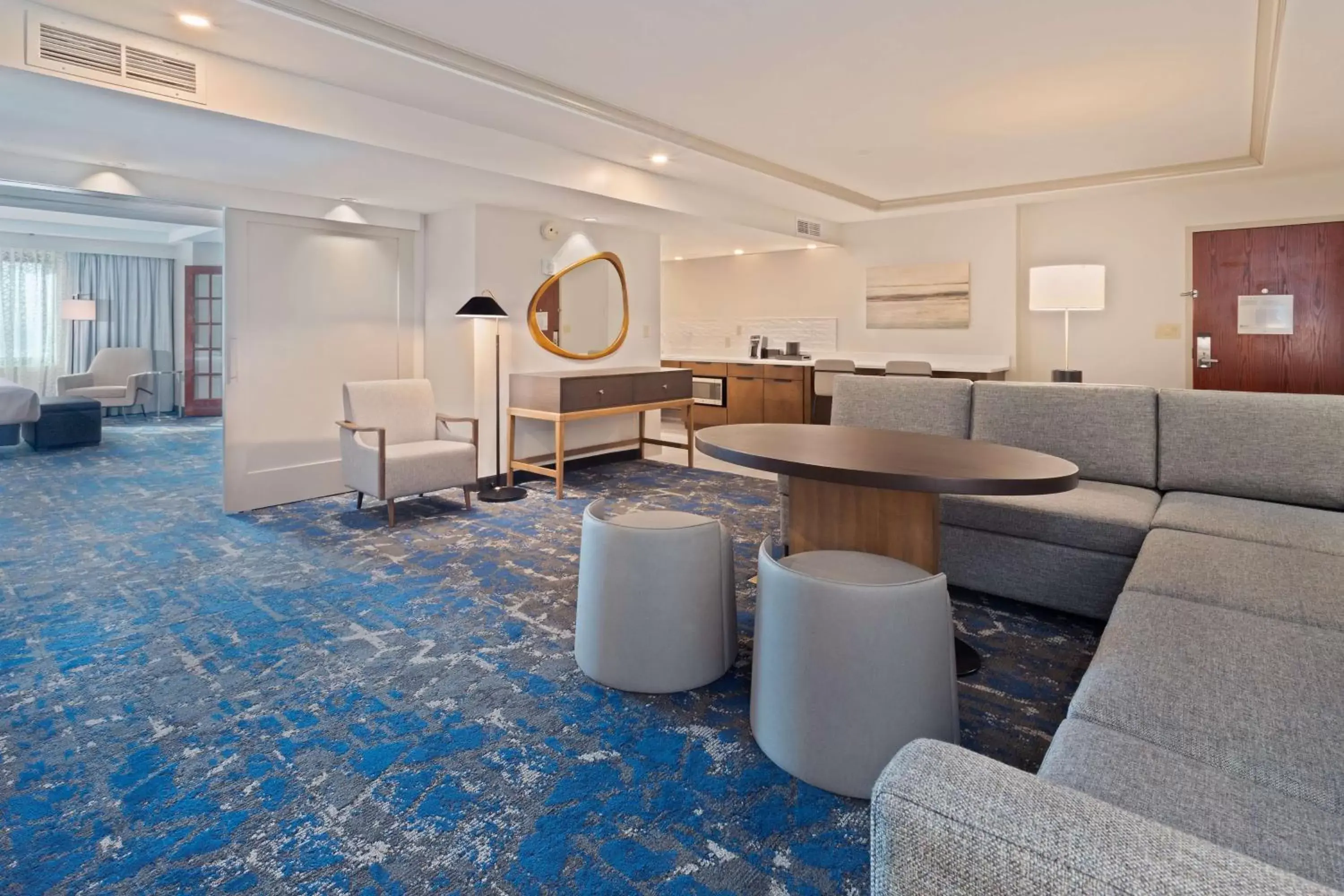 Living room in Embassy Suites by Hilton Tampa USF Near Busch Gardens Living room in Embassy Suites by Hilton Tampa USF Near Busch Gardens