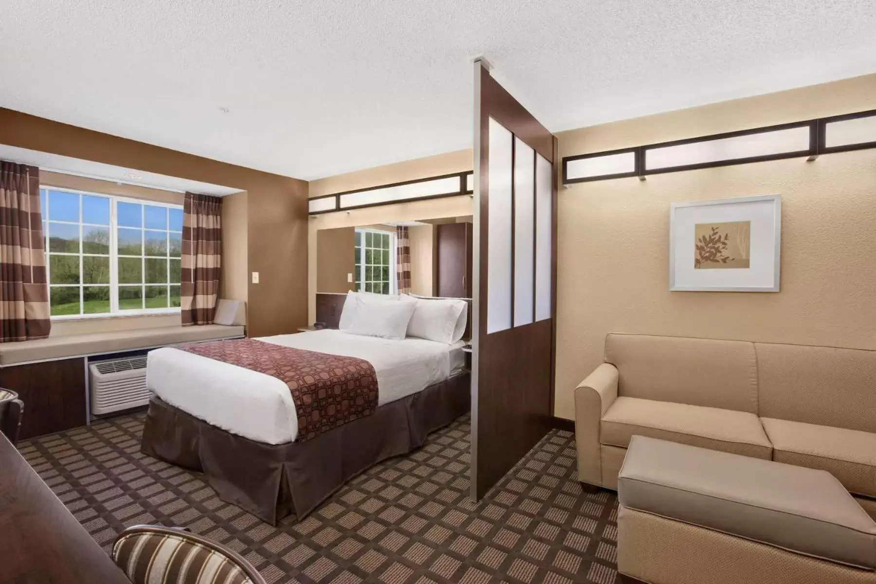 Bed in Microtel Inn & Suites-Sayre, PA