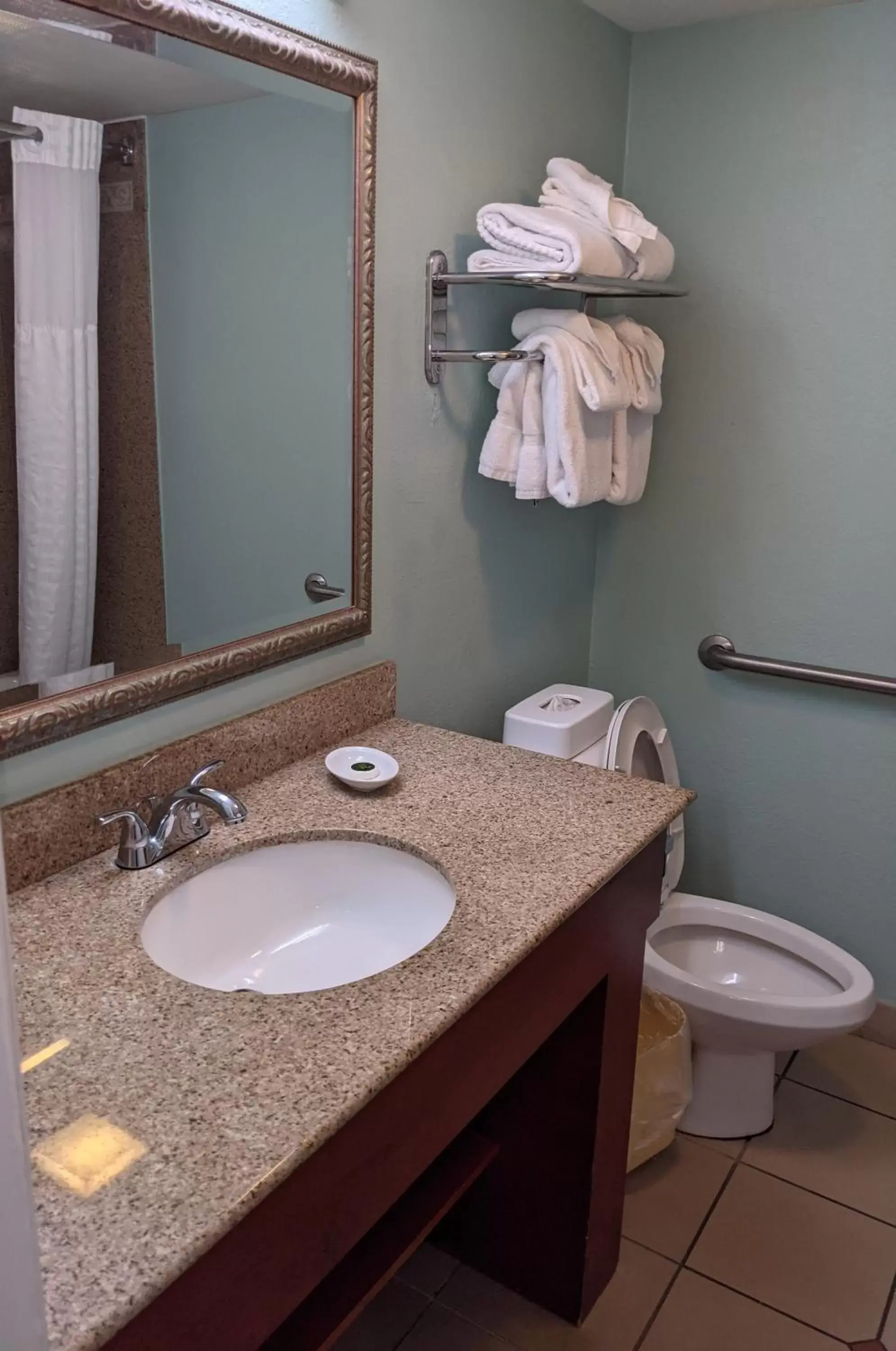 Bathroom in Beachside Hotel and Suites