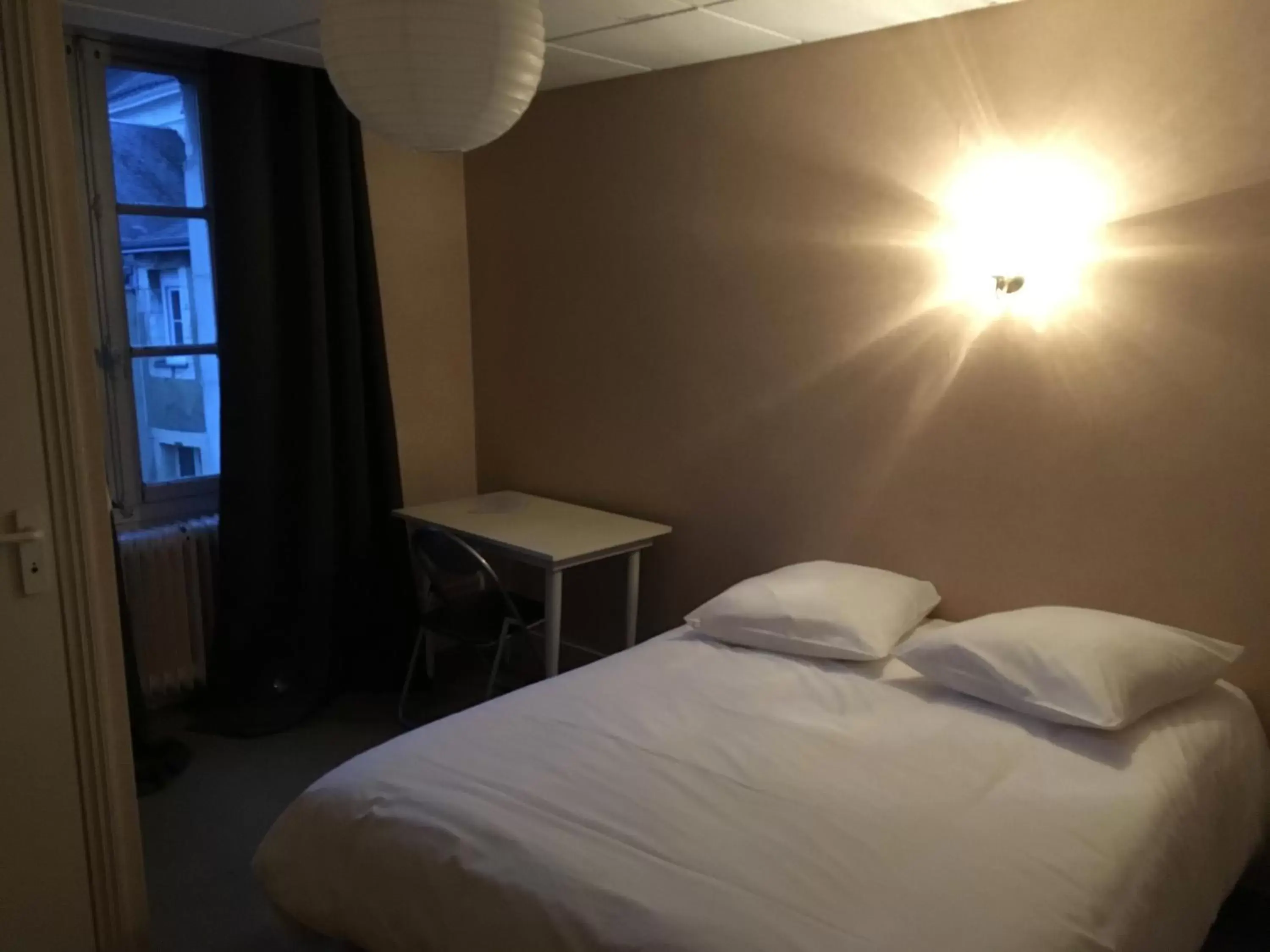 Bed in Hotel de la gare