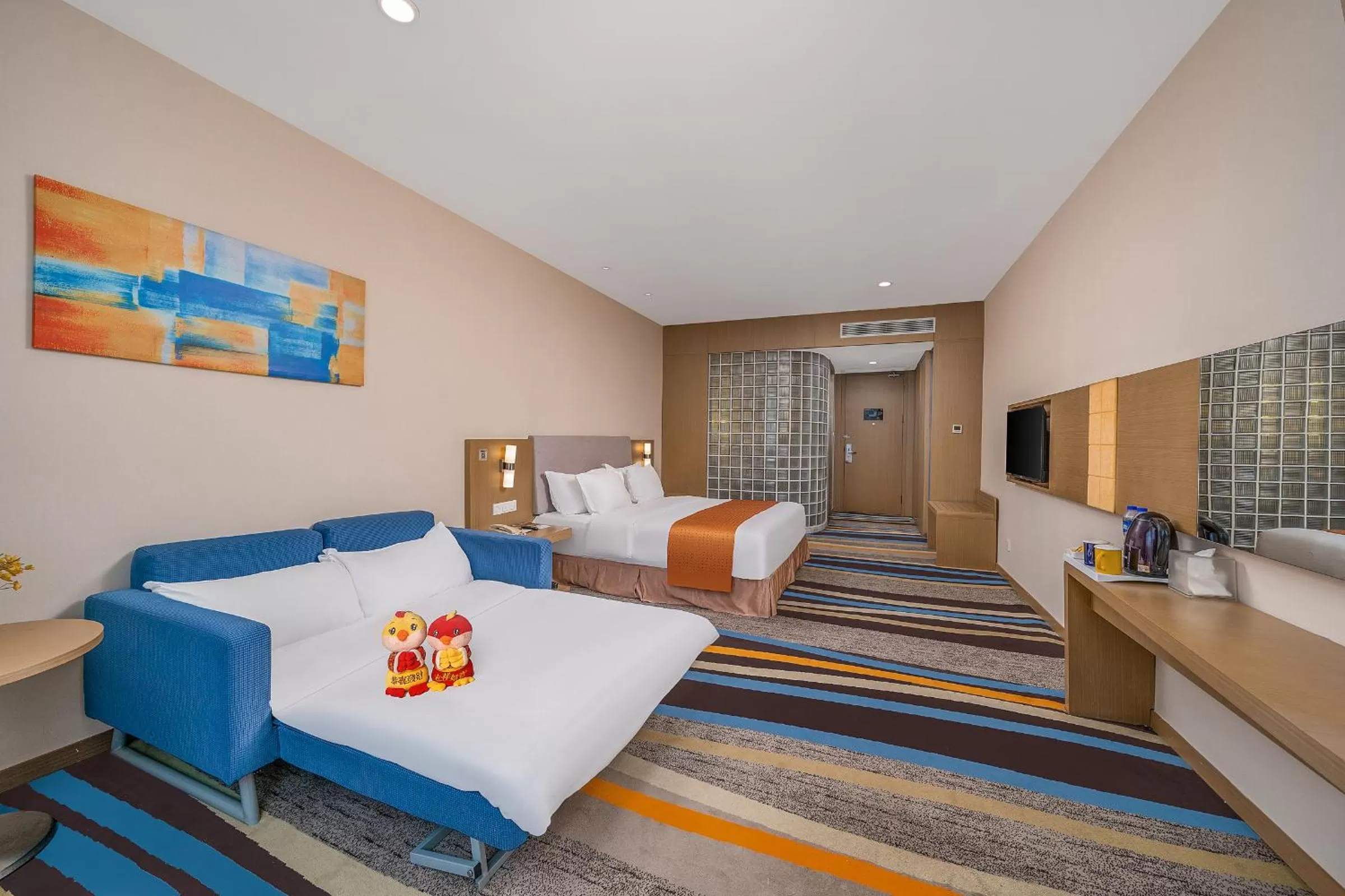 Photo of the whole room, Bed in Guangzhou Baiyun Airport Rejoice by Argyle Hotel Rehe Metro Exit B --Free shuttle bus is provided during the 138th Canton Fair