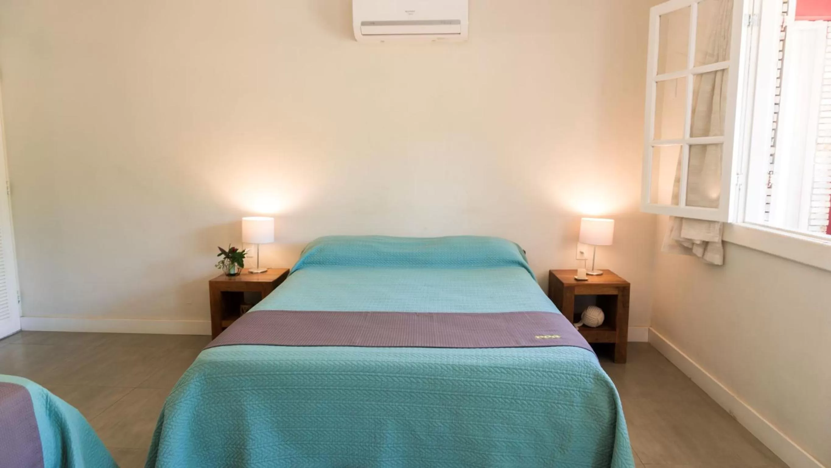 Bed in Pousada Tartaruga