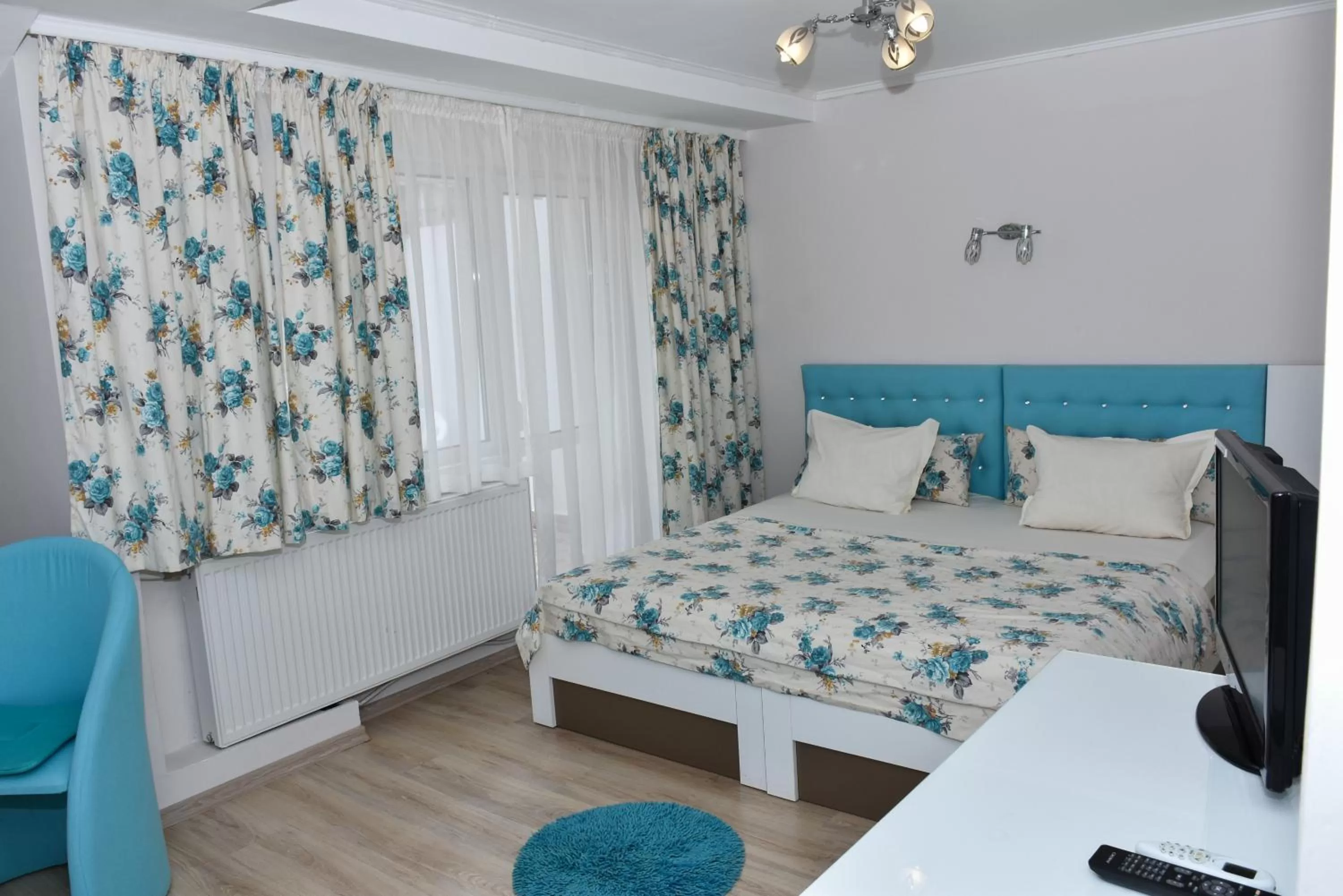 Bed in White Rose Guest Rooms