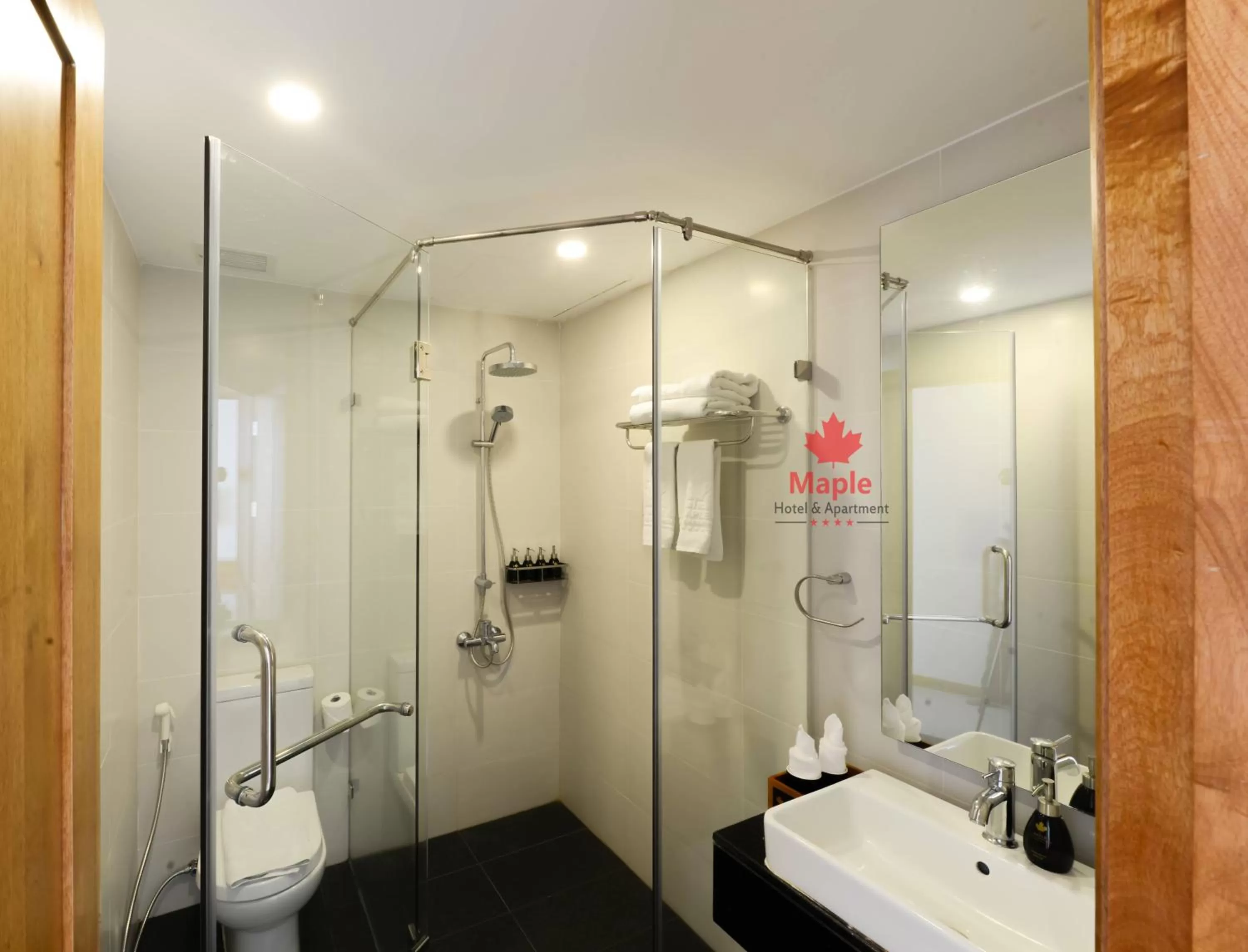 Shower in Maple Hotel & Apartment