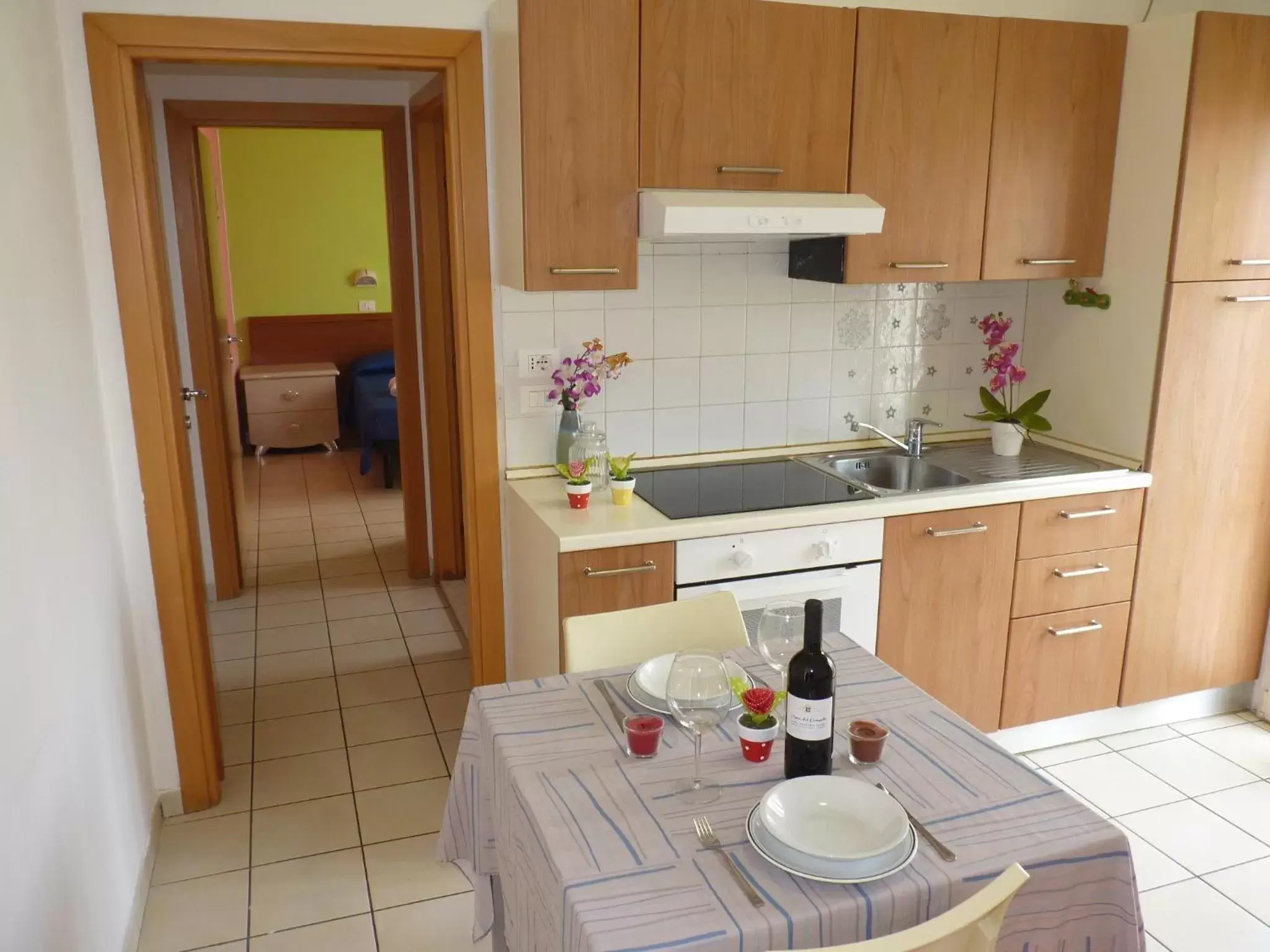 Dining area, Kitchen/Kitchenette in Residence Costablu