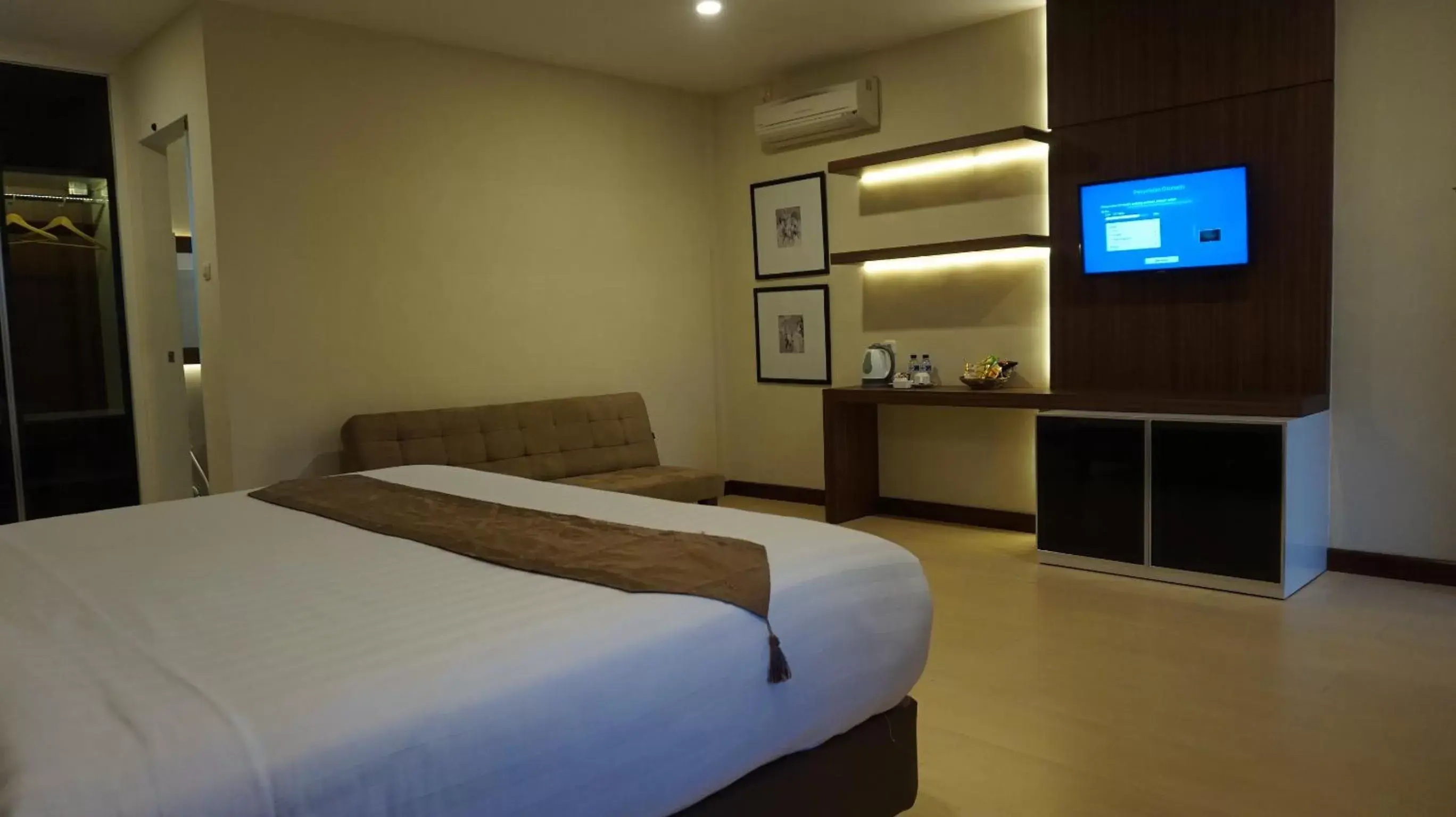 Bed in Grand Harvest Resort & Villas