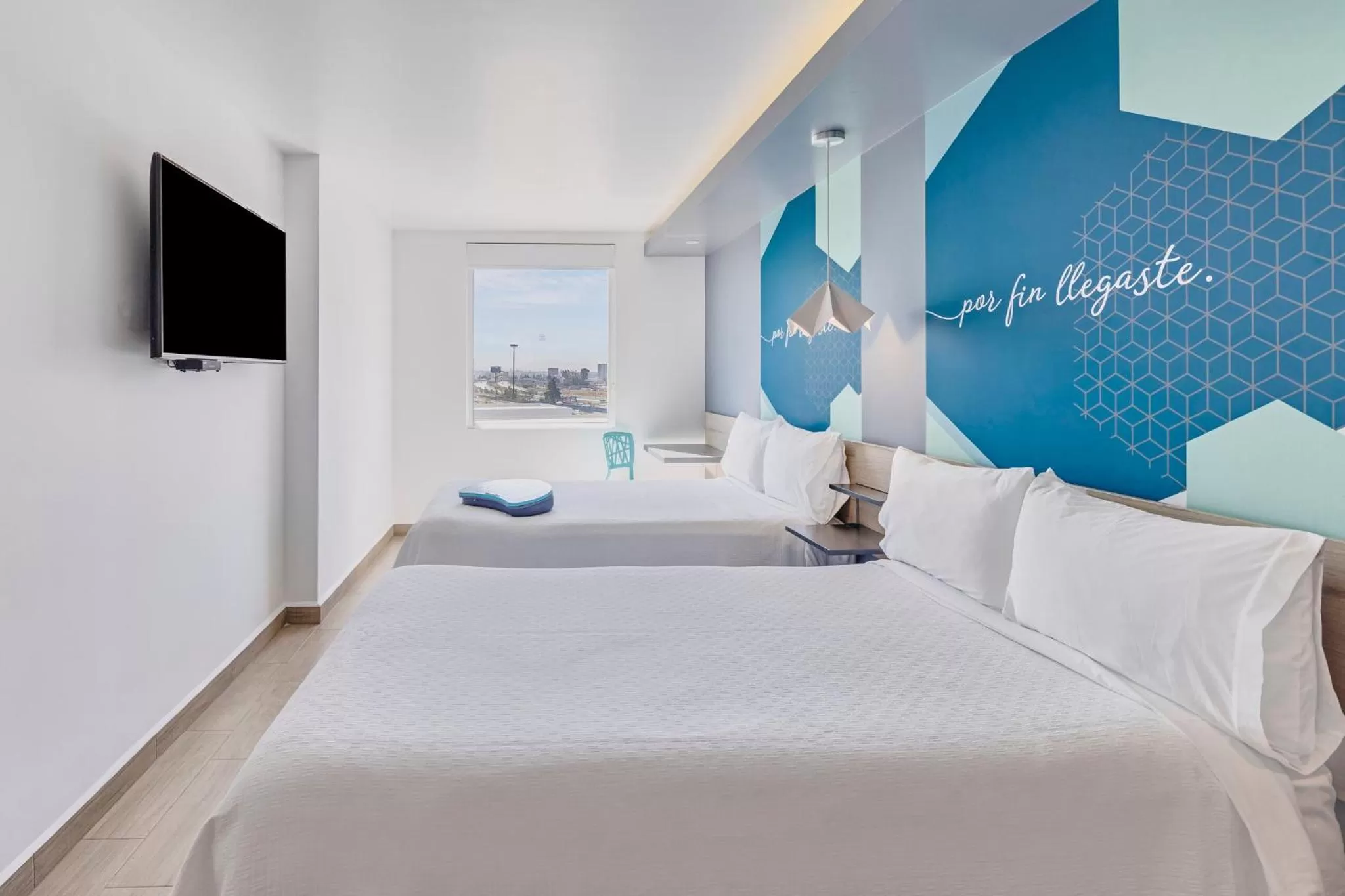 Photo of the whole room, Bed in One Puebla Angelopolis Periferico