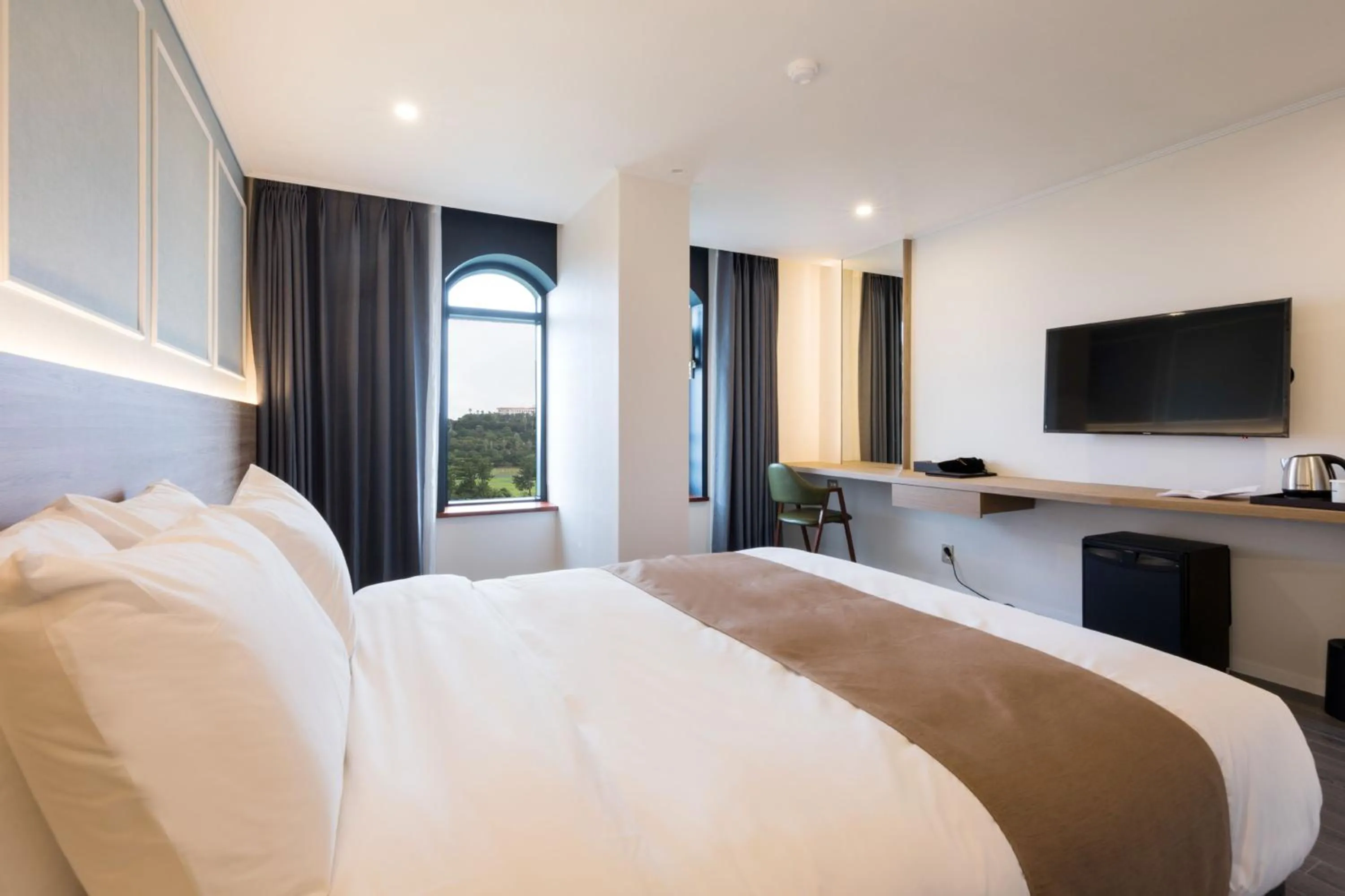 Bed in Casaloma Hotel