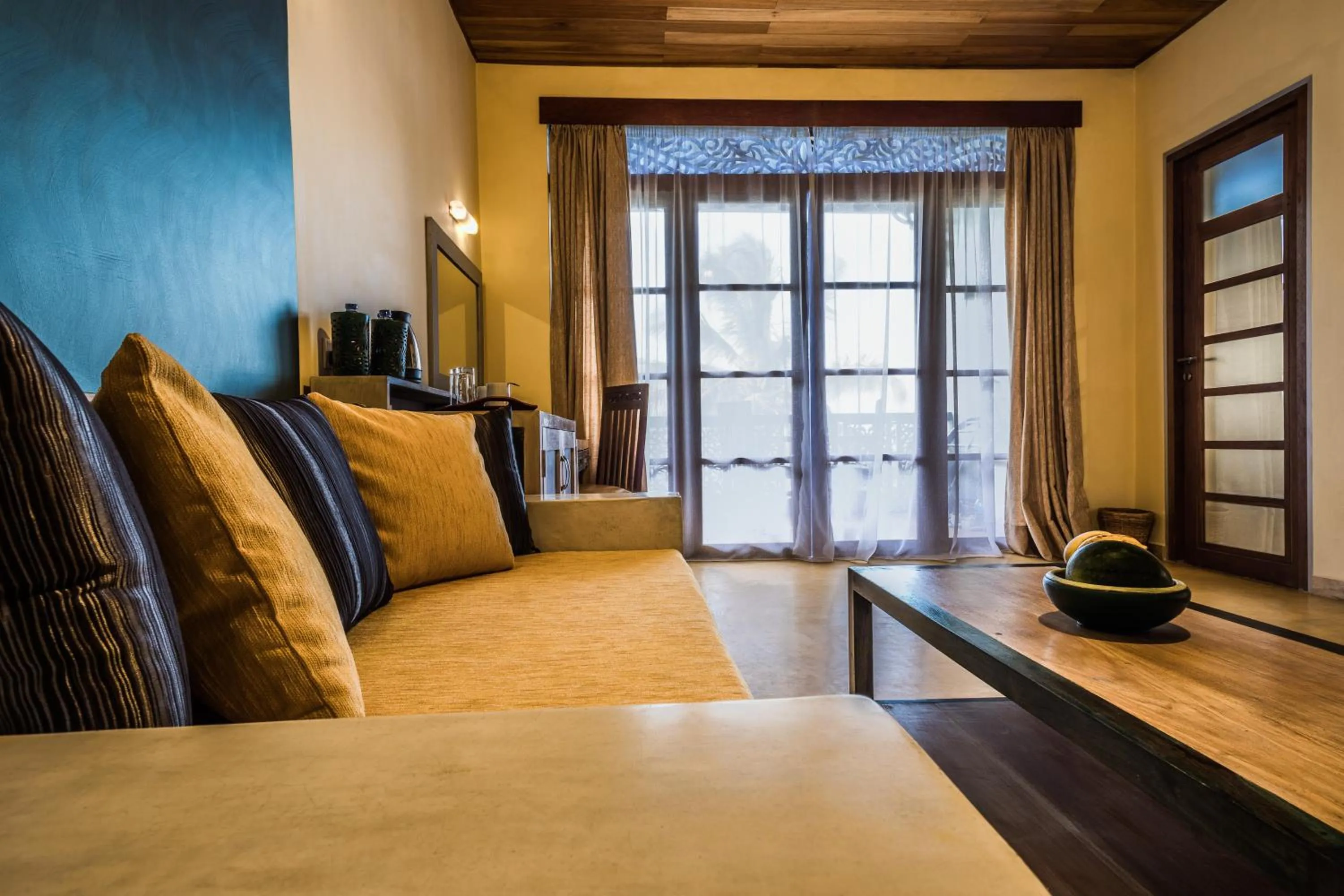 Seating area, Bed in Yasmin Hill Longevity Oasis