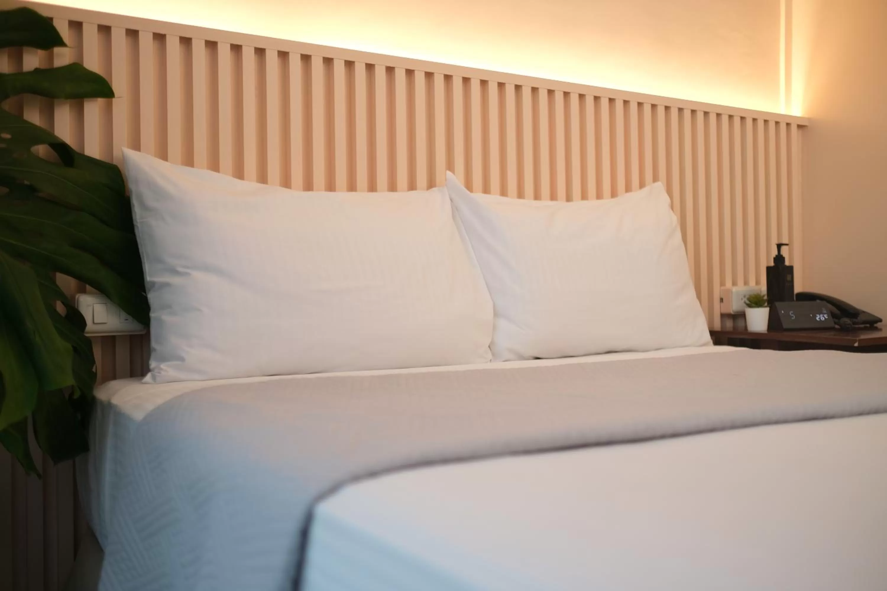 Bed in Dosi Hotel PH