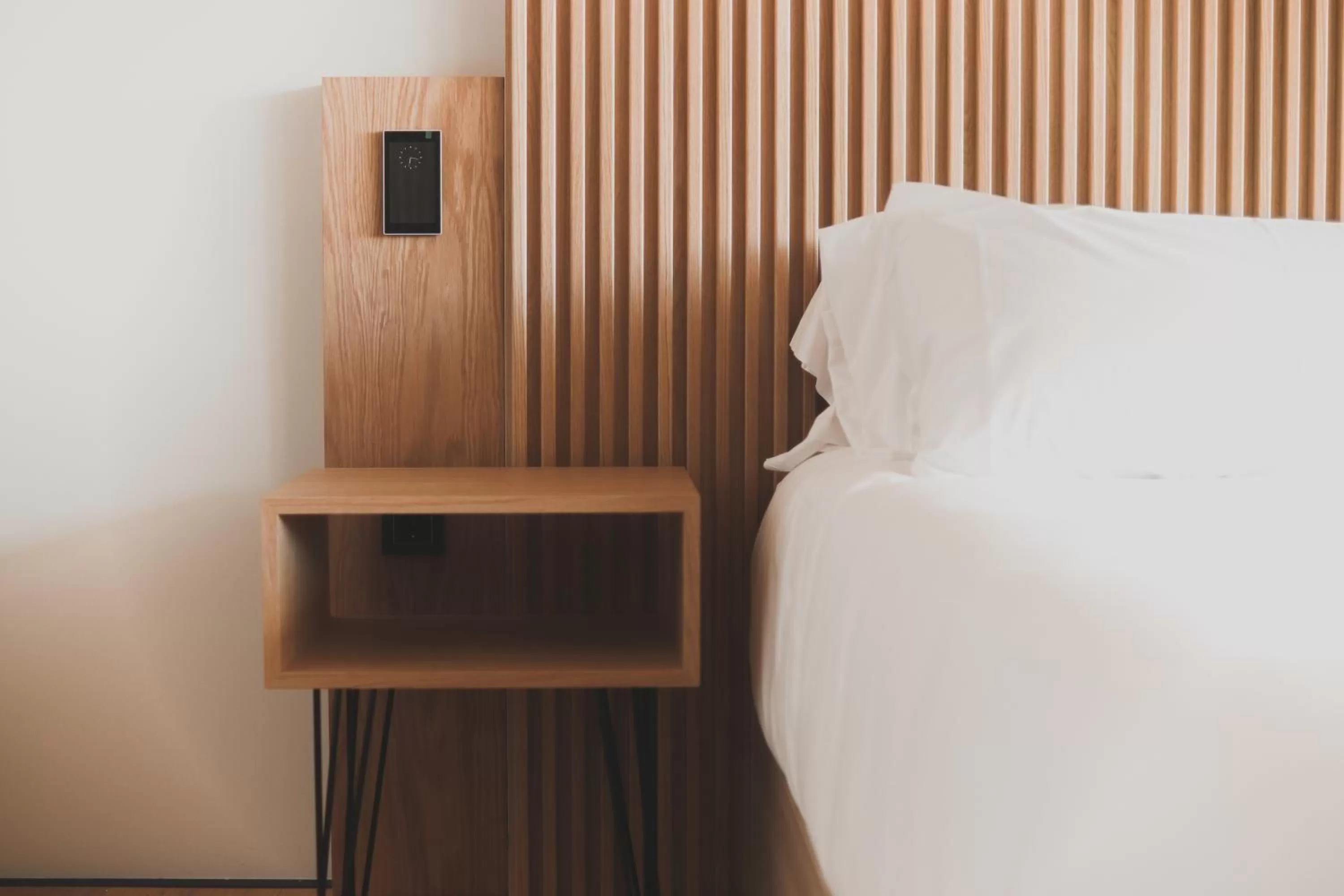 Bed, TV/Entertainment Center in Atmos Hotel Boutique