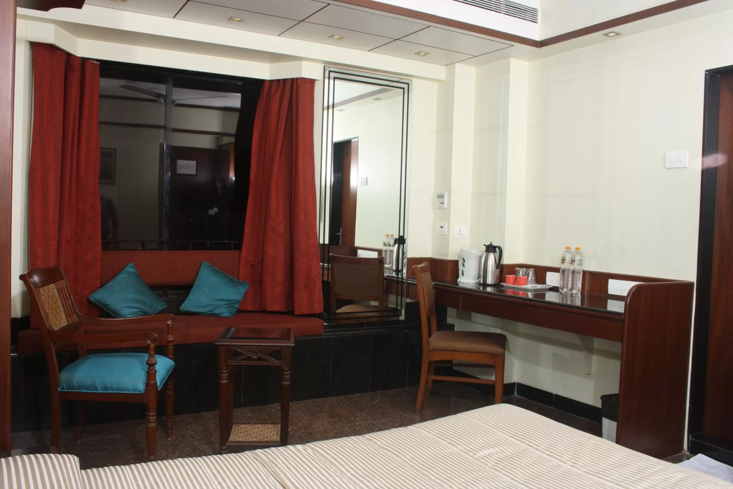 Bed in Hotel Karl Residency