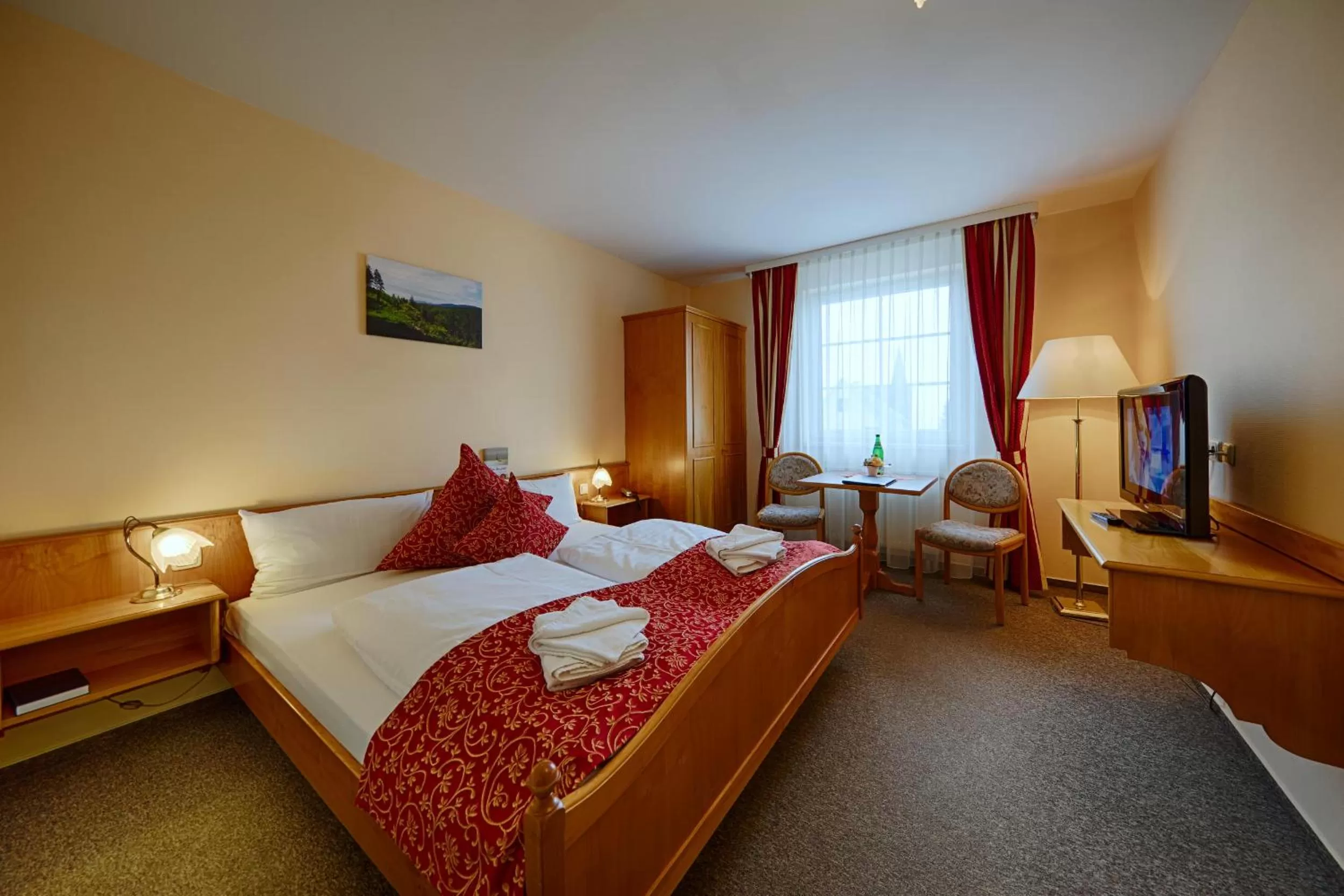 Photo of the whole room, Bed in Hotel Auerhahn