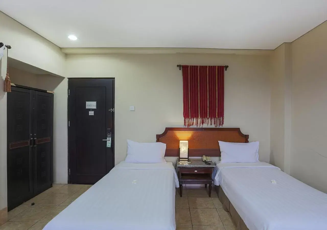 Bed in The Jayakarta Suites Komodo Flores