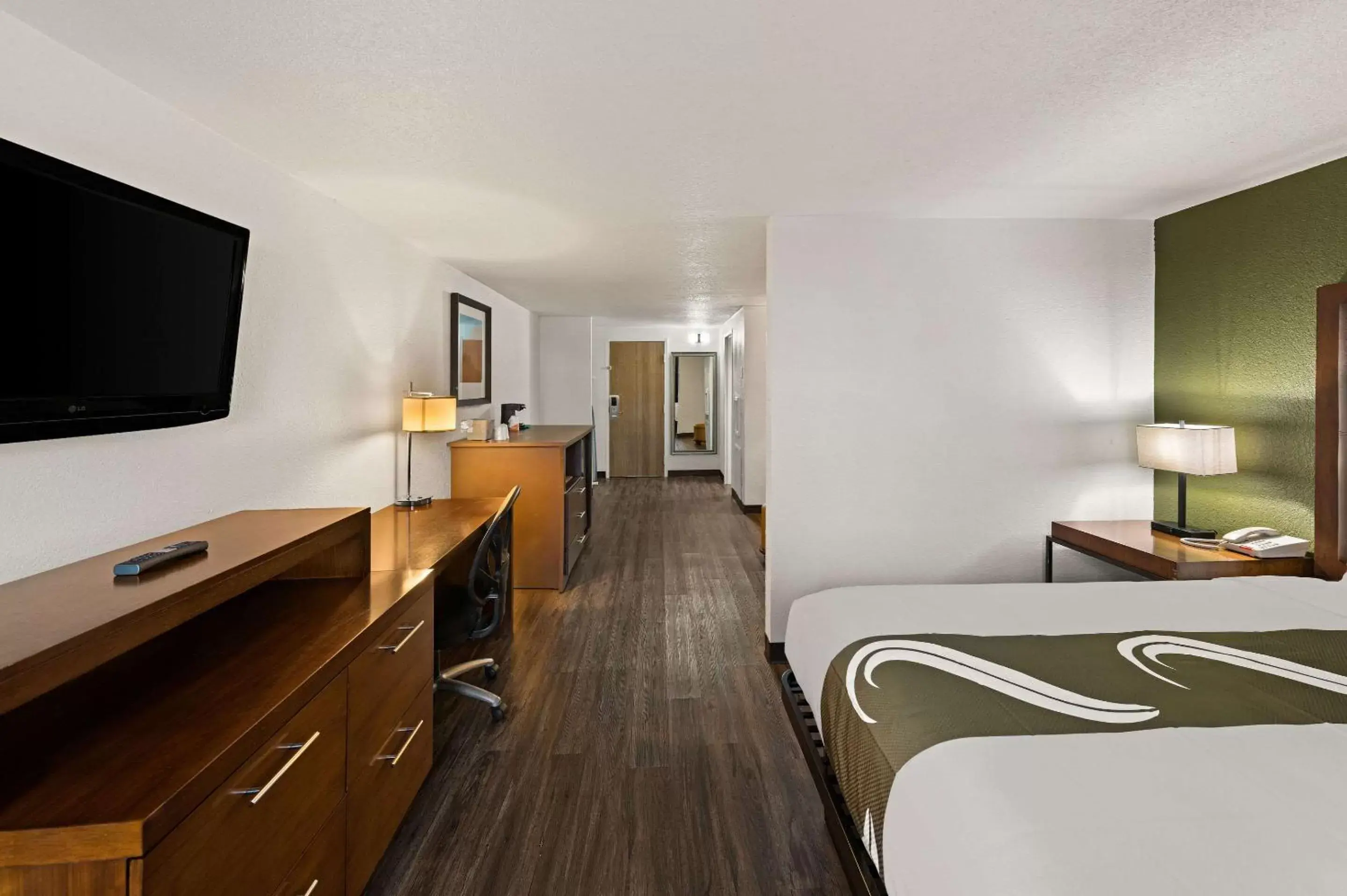 Bedroom, TV/Entertainment Center in Quality Inn & Suites near I-480 and I-29