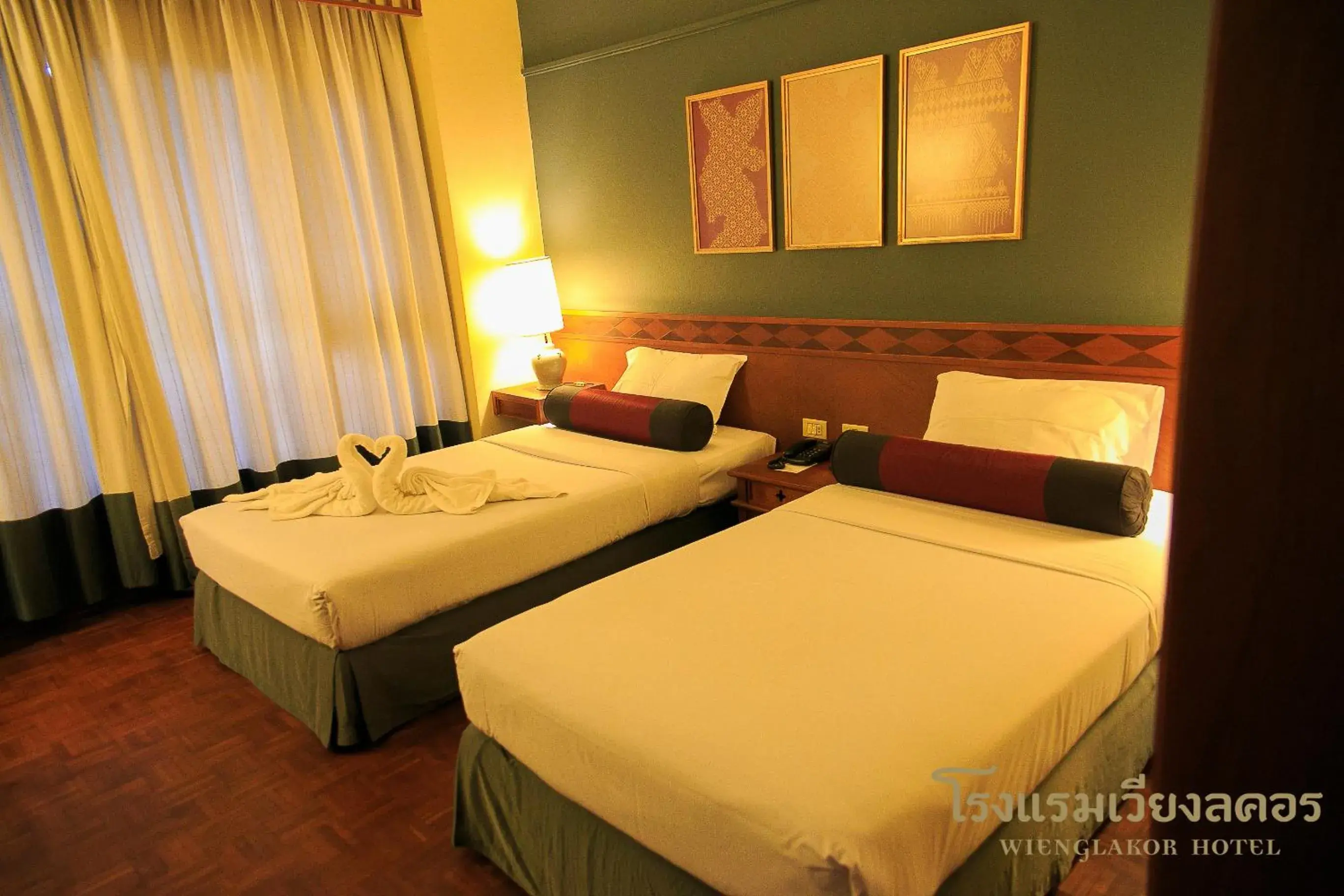 Photo of the whole room, Bed in Wienglakor Hotel (SHA Extra Plus)