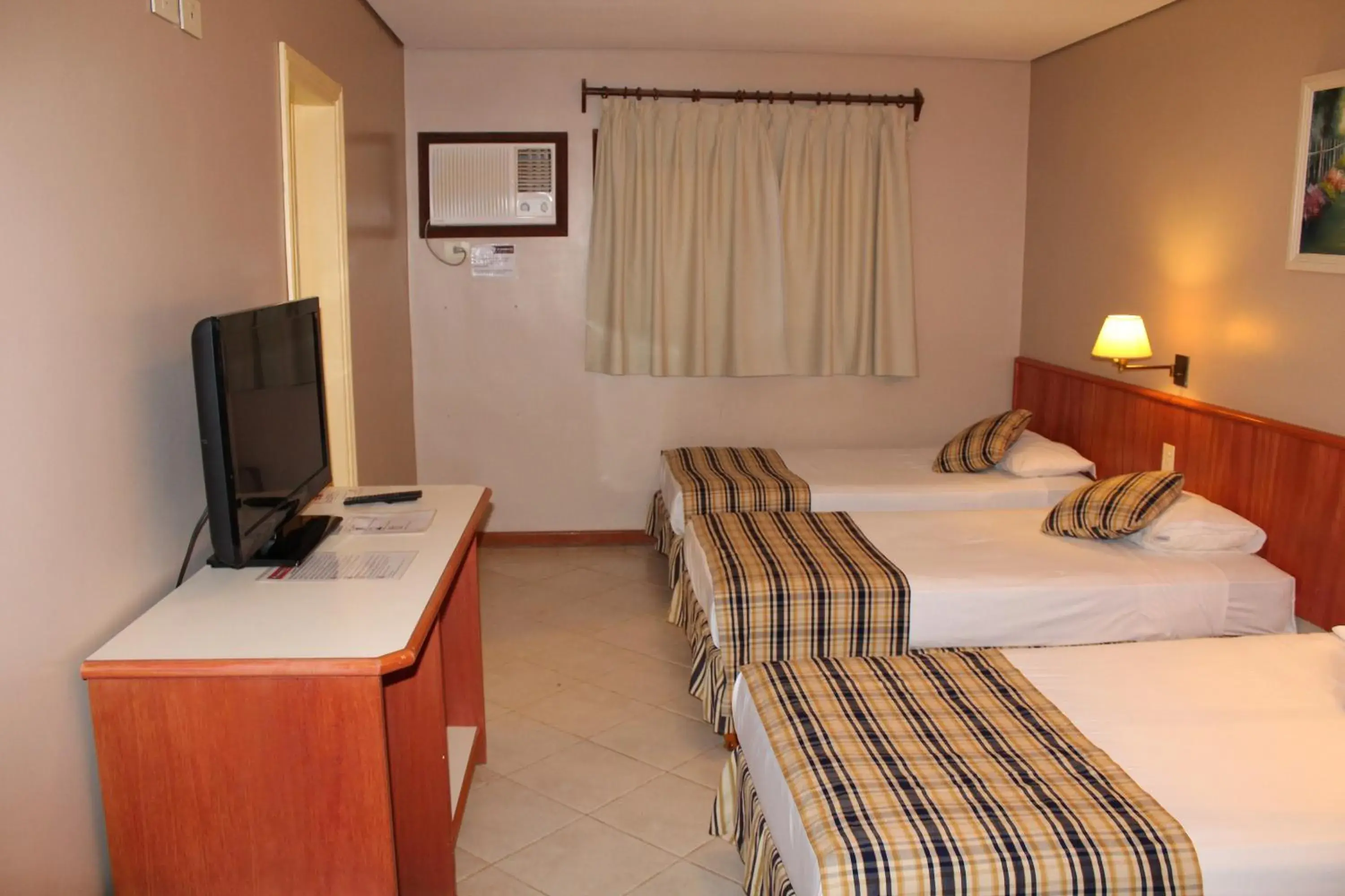 Photo of the whole room, TV/Entertainment Center in Marcopolo Suites Iguazu