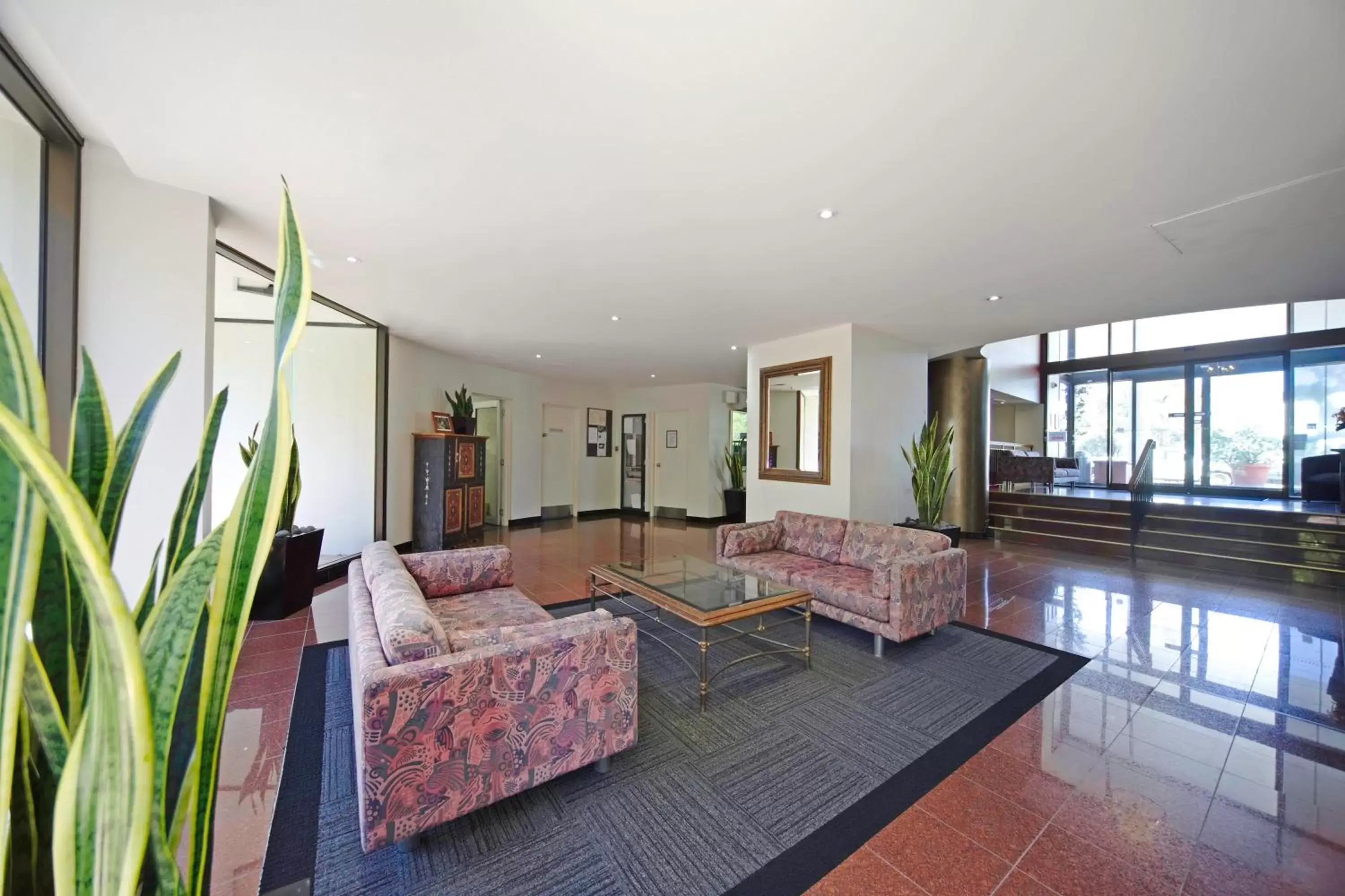 Lobby or reception, Seating Area in BreakFree Capital Tower Apartments