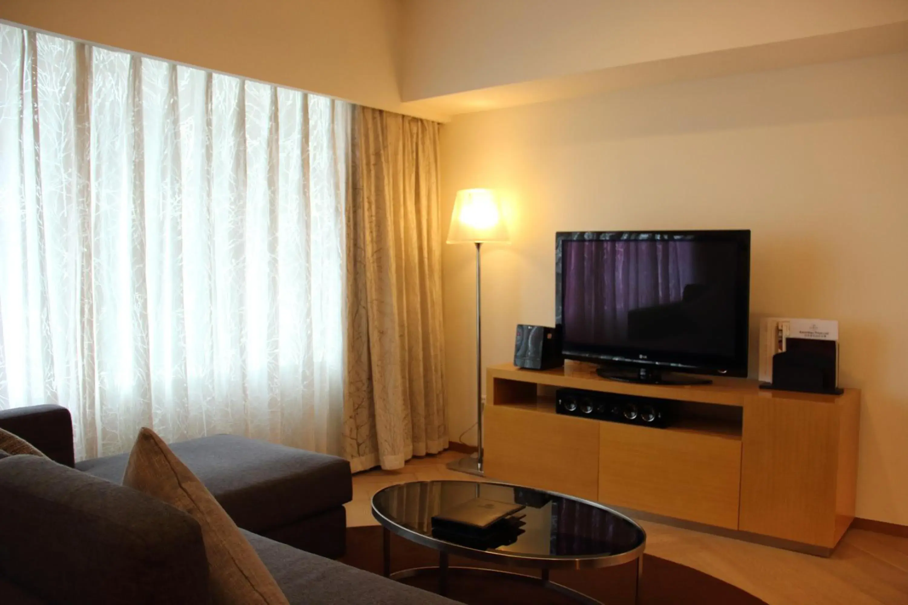 Living room, TV/Entertainment Center in Somerset Riverview Chengdu