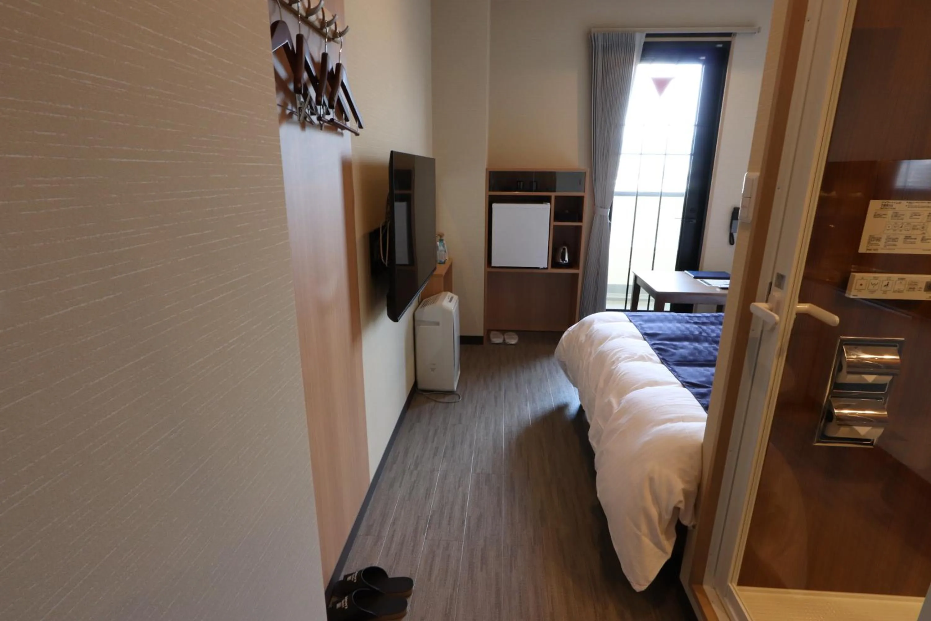 Photo of the whole room, Bed in Hotel Kanade Kanku Kaizuka