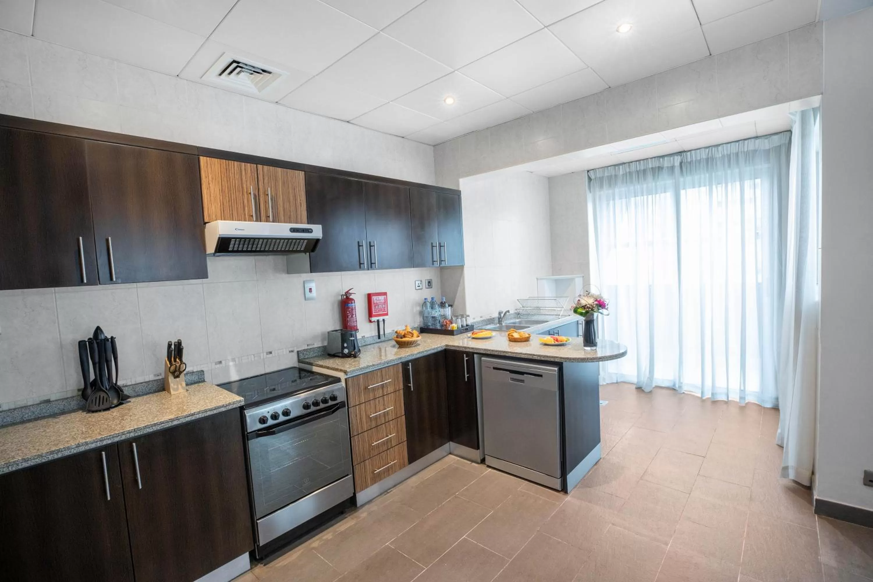Kitchen or kitchenette in City Premiere Hotel Apartments - Dubai