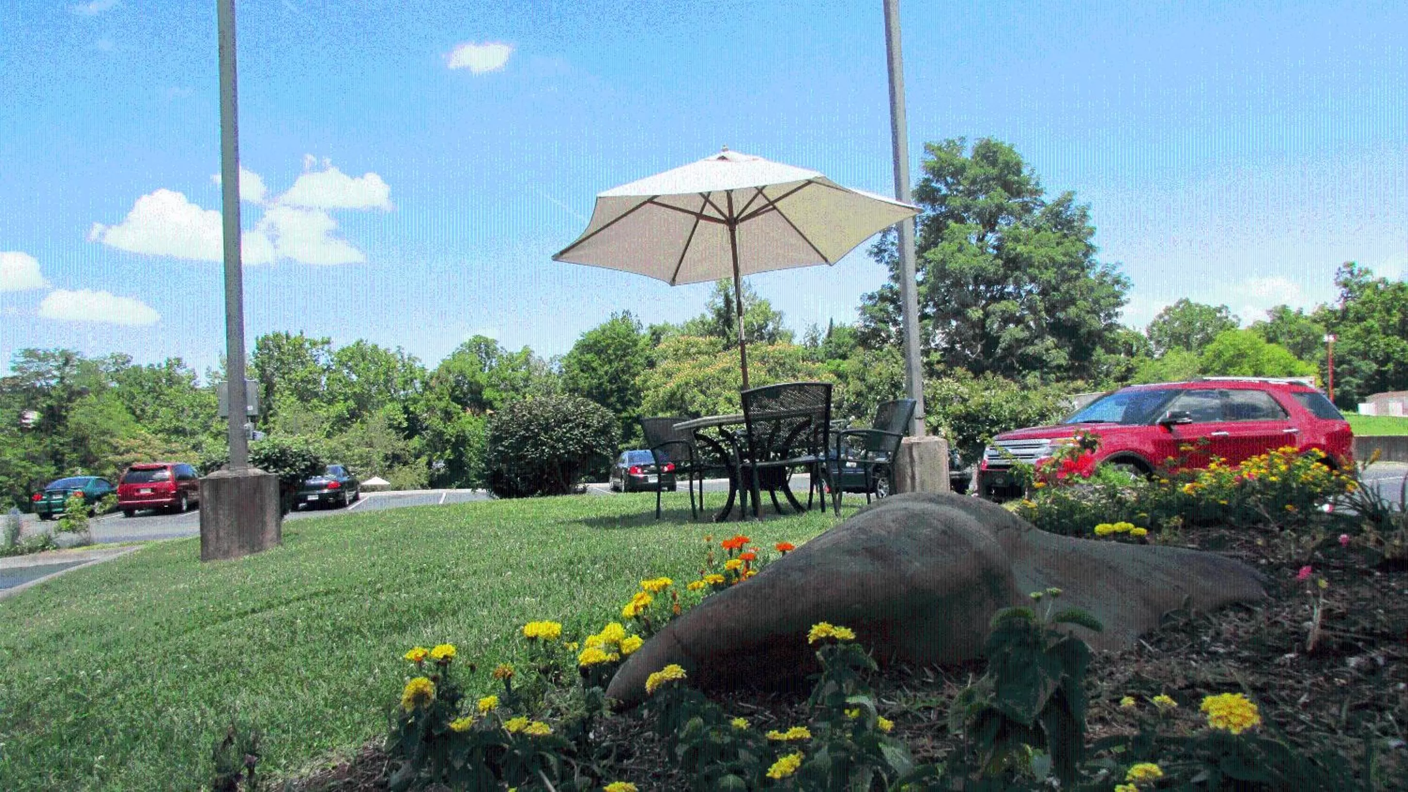 Property building in Arbors at Island Landing Hotel & Suites